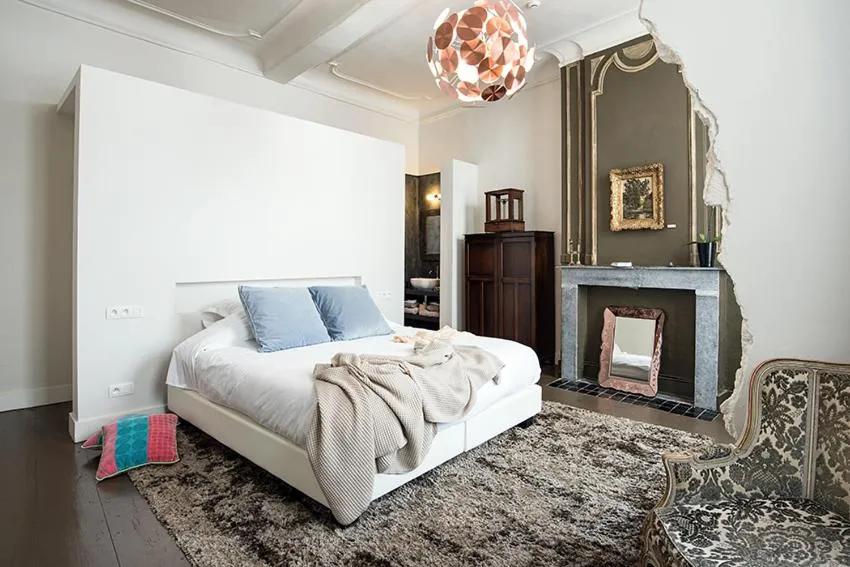 Bed in Ganda Rooms & Suites