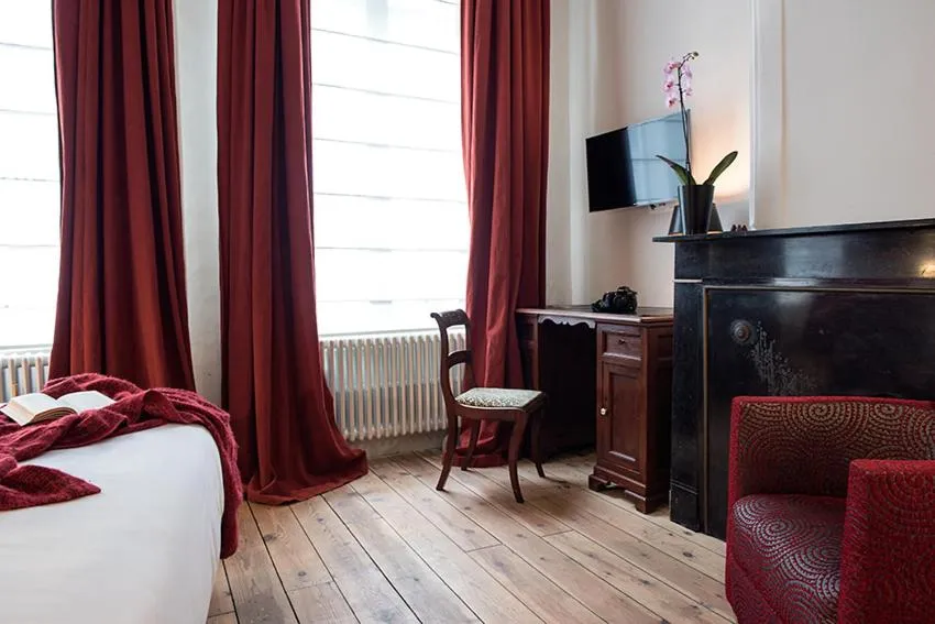 Bed in Ganda Rooms & Suites