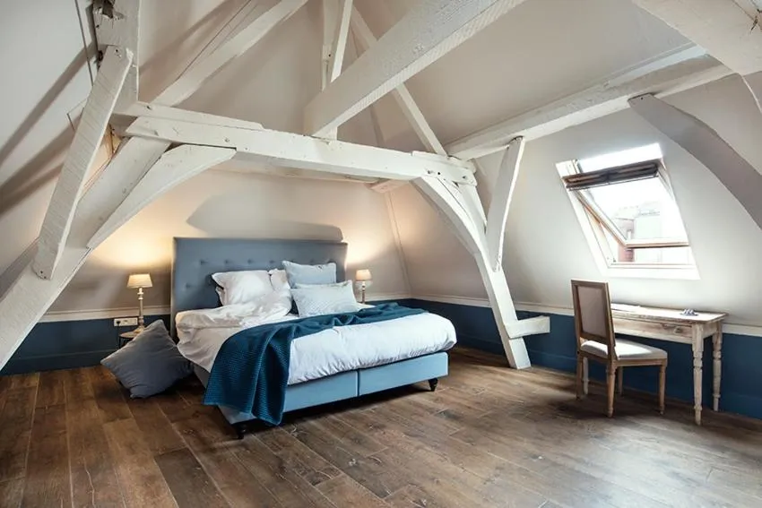 Bed in Ganda Rooms & Suites