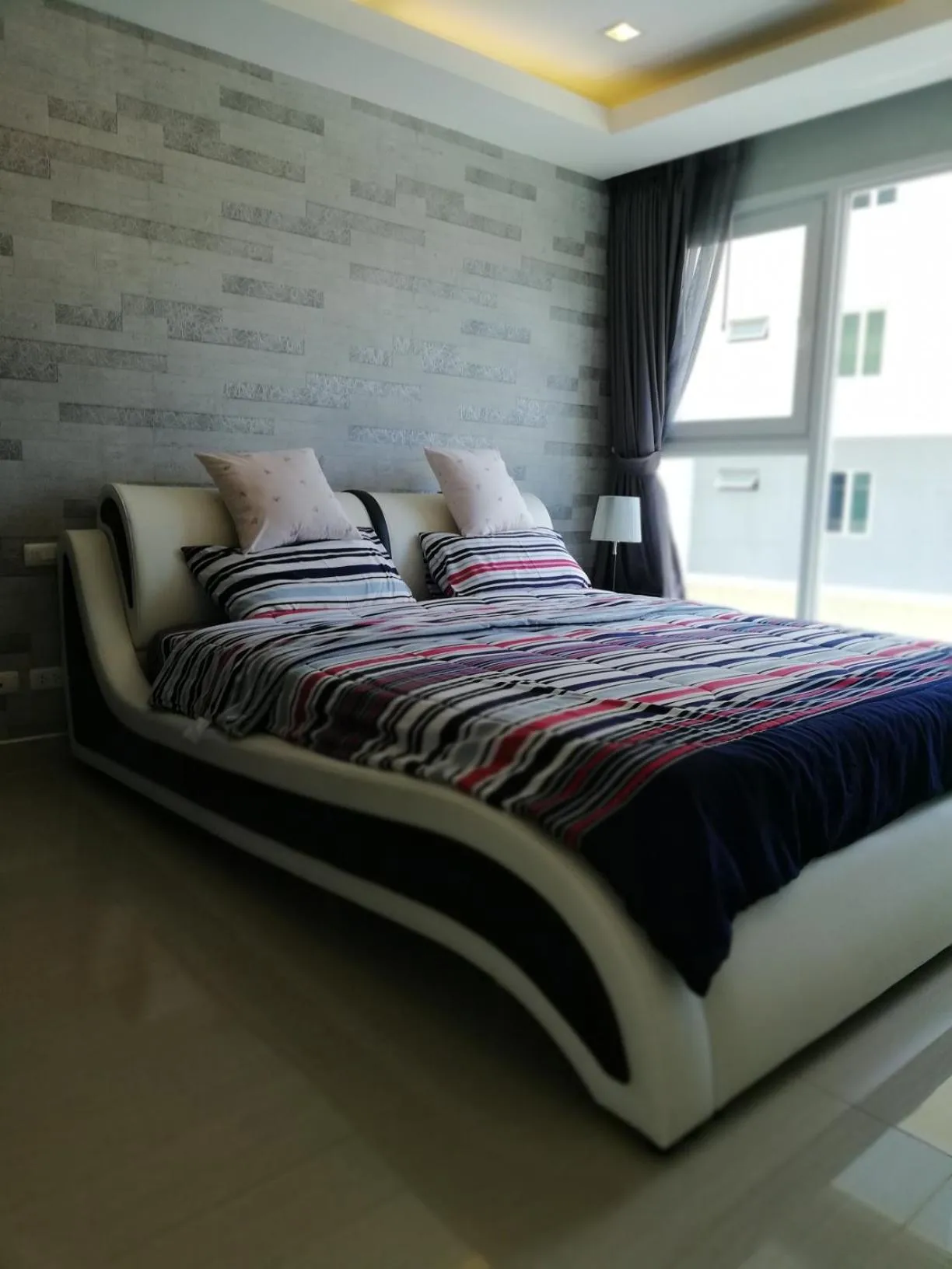 Bed in Cosy Beach View Apartments