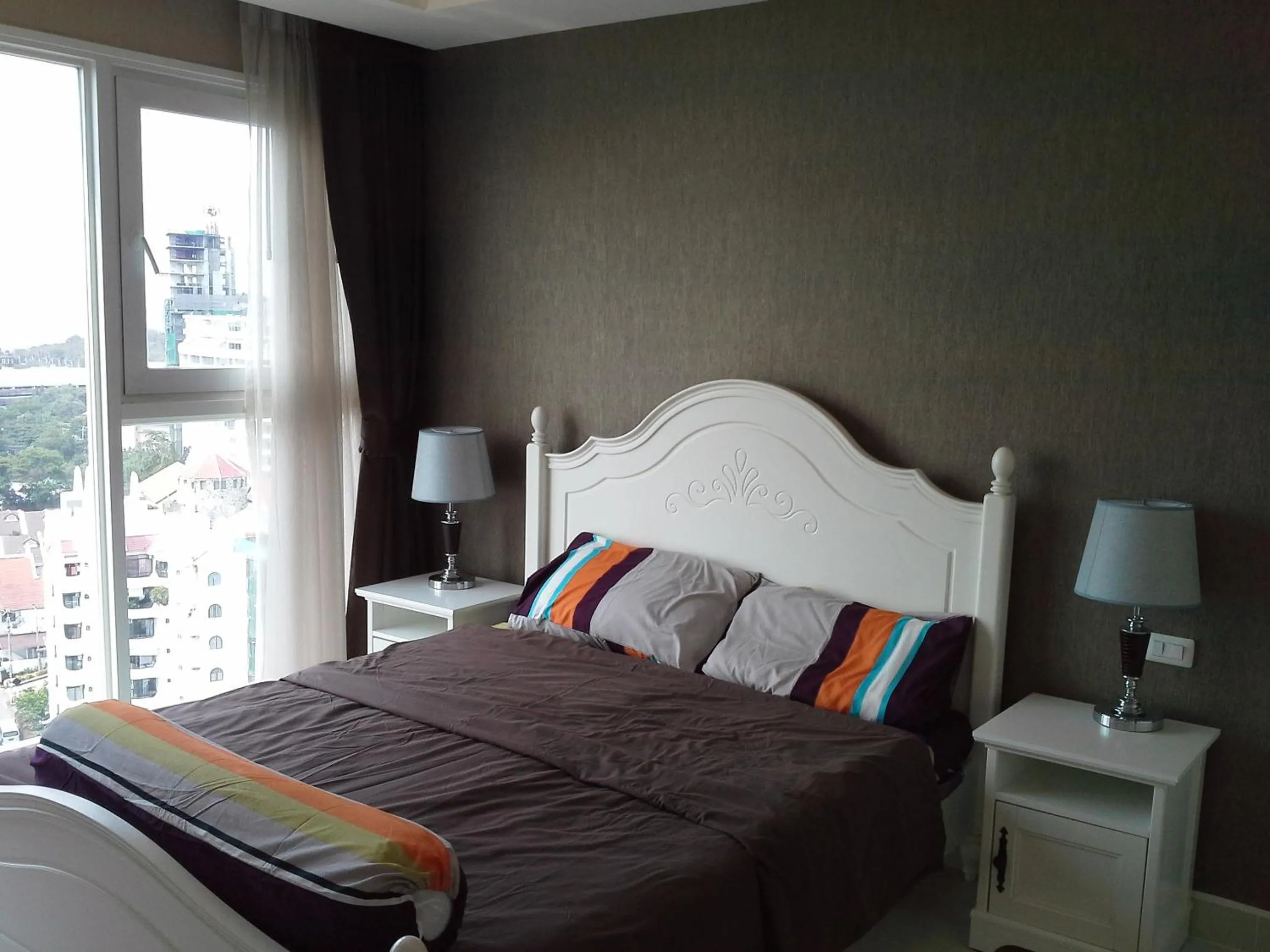 Bed in Cosy Beach View Apartments