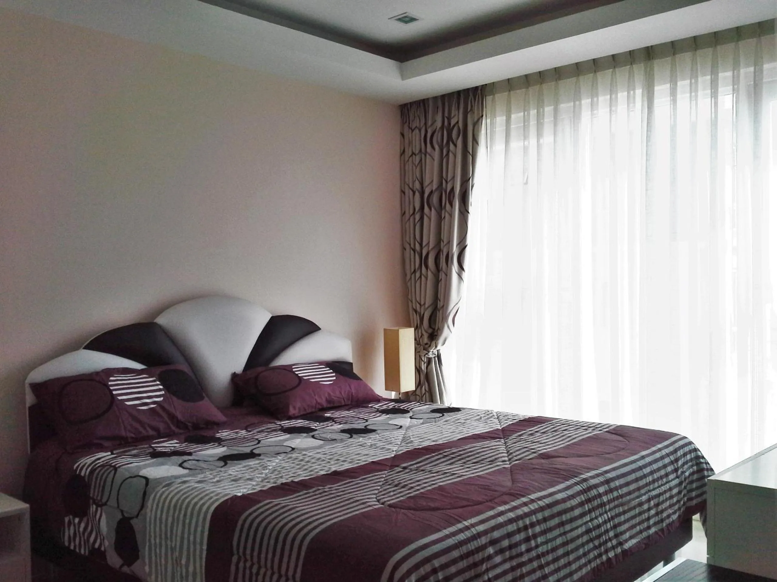 Bed in Cosy Beach View Apartments