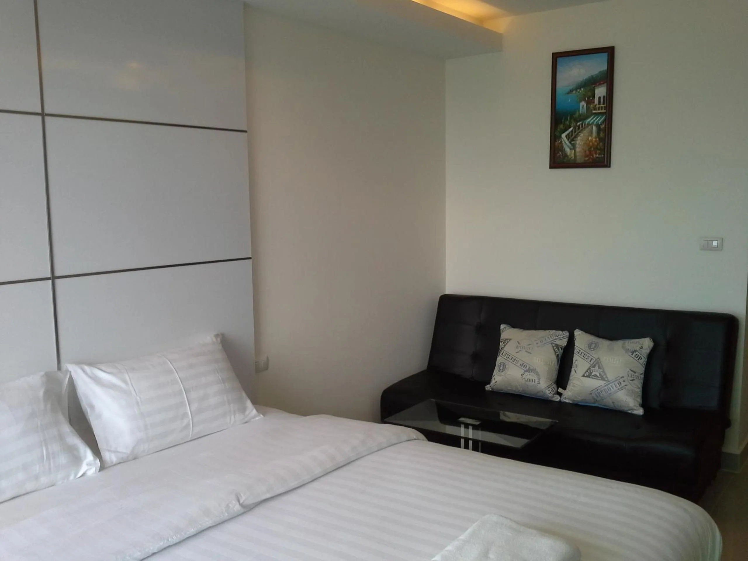 Bed in Cosy Beach View Apartments