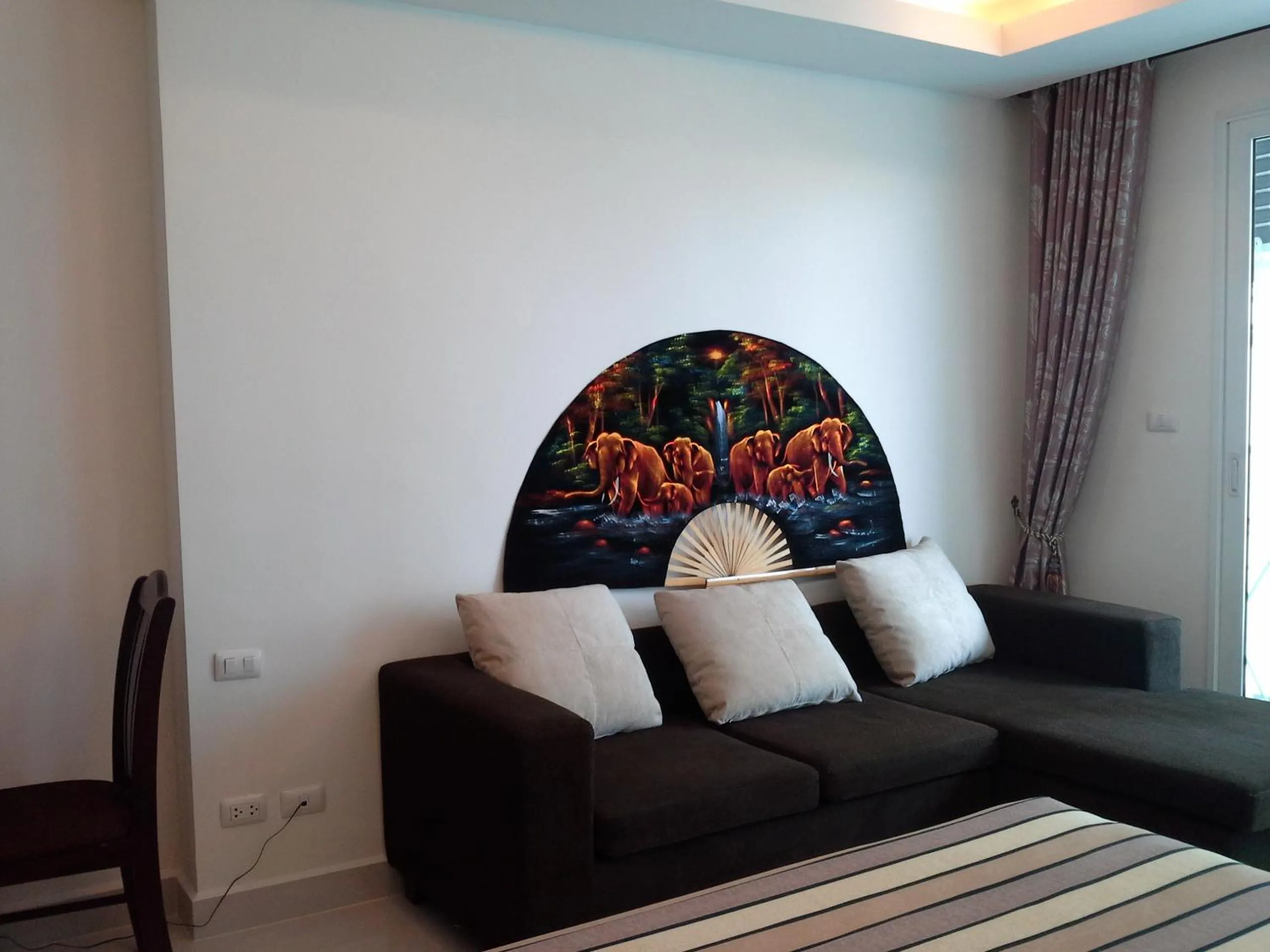 Living room, Bed in Cosy Beach View Apartments