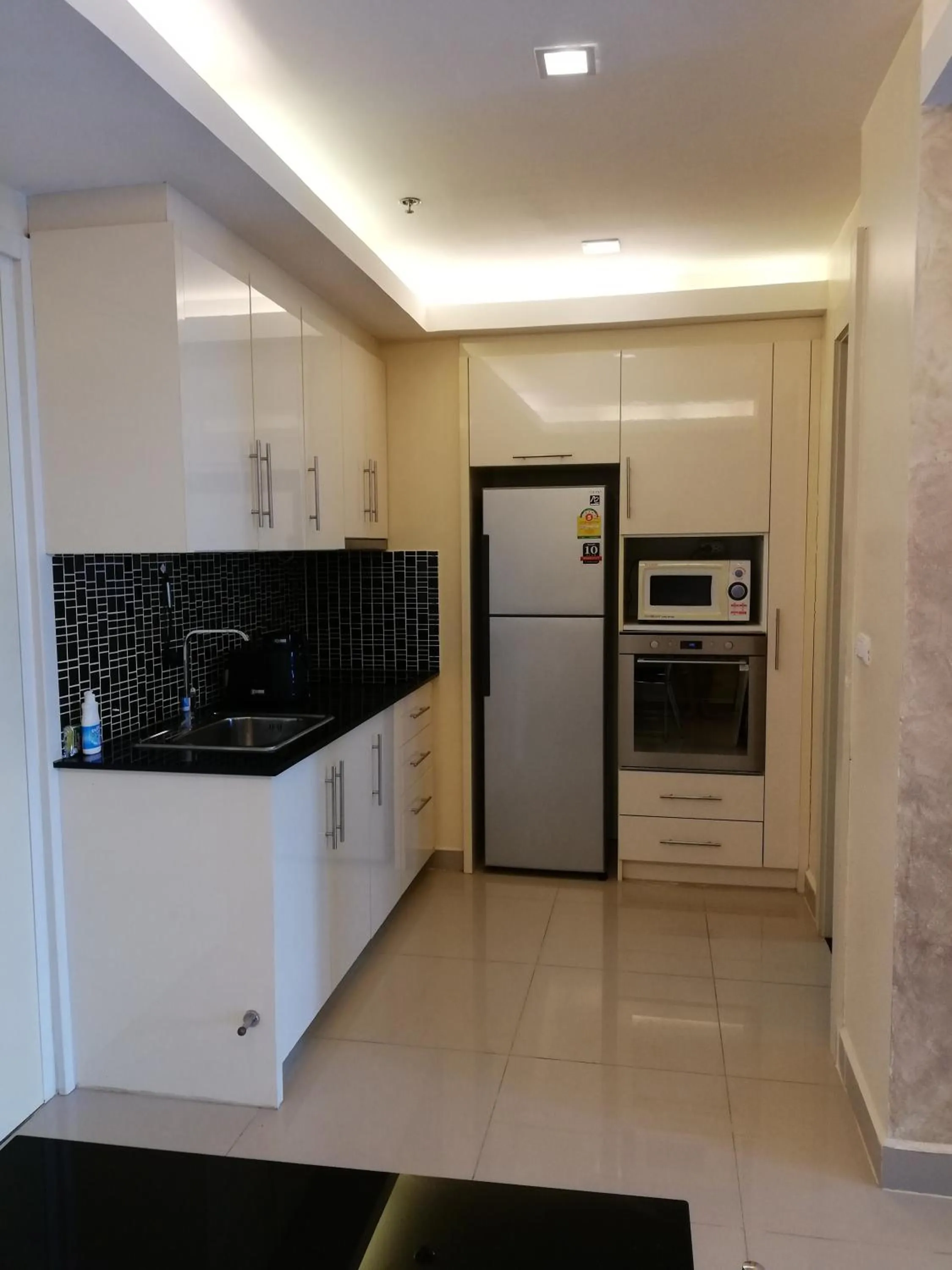 Kitchen or kitchenette in Cosy Beach View Apartments