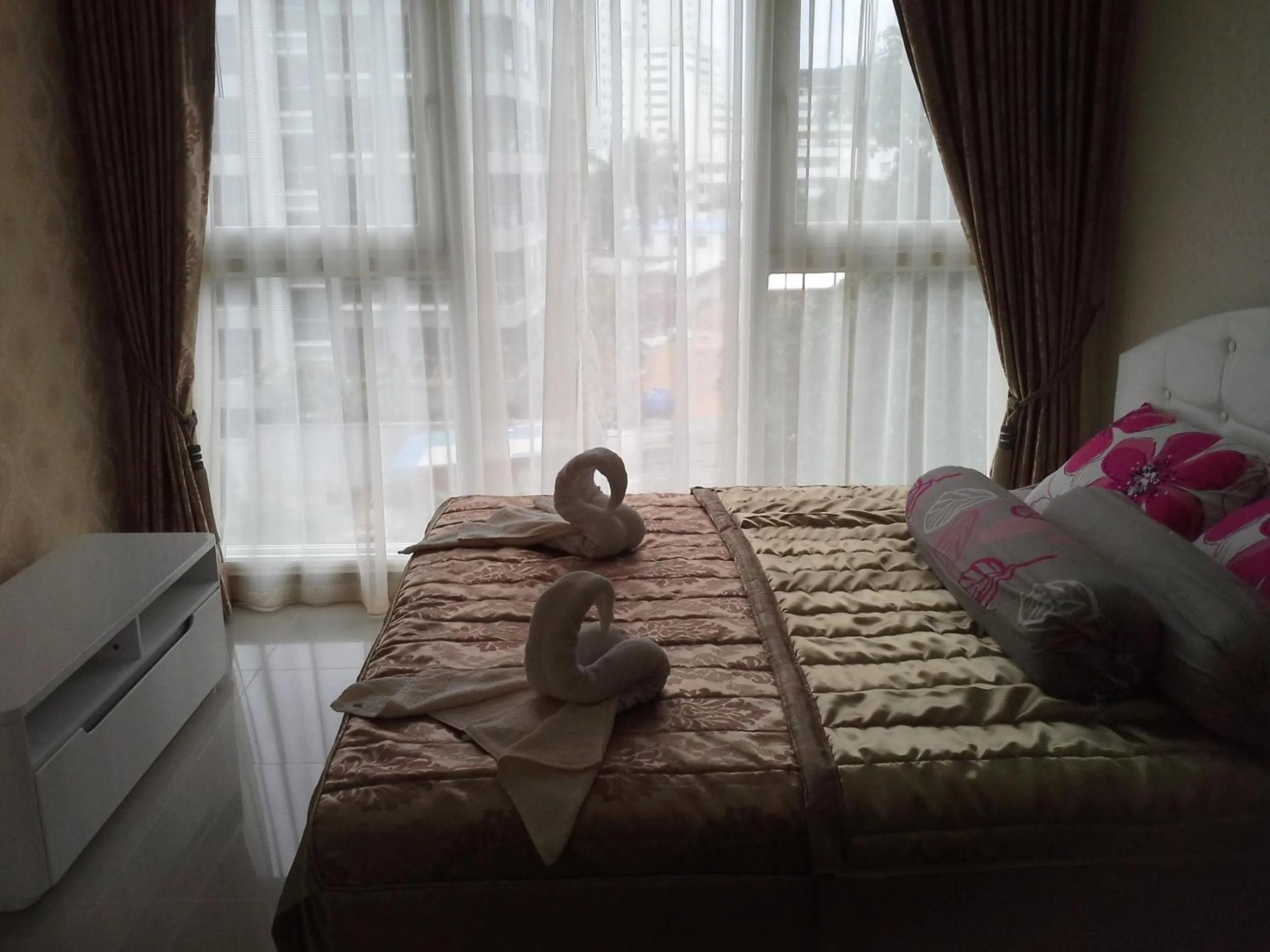 Bed in Cosy Beach View Apartments