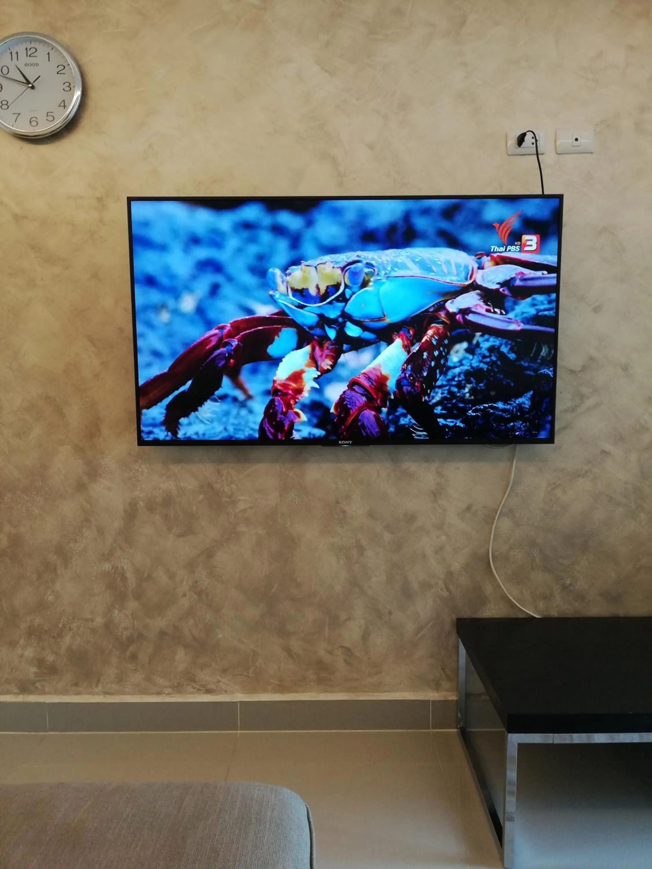 Communal lounge/ TV room in Cosy Beach View Apartments