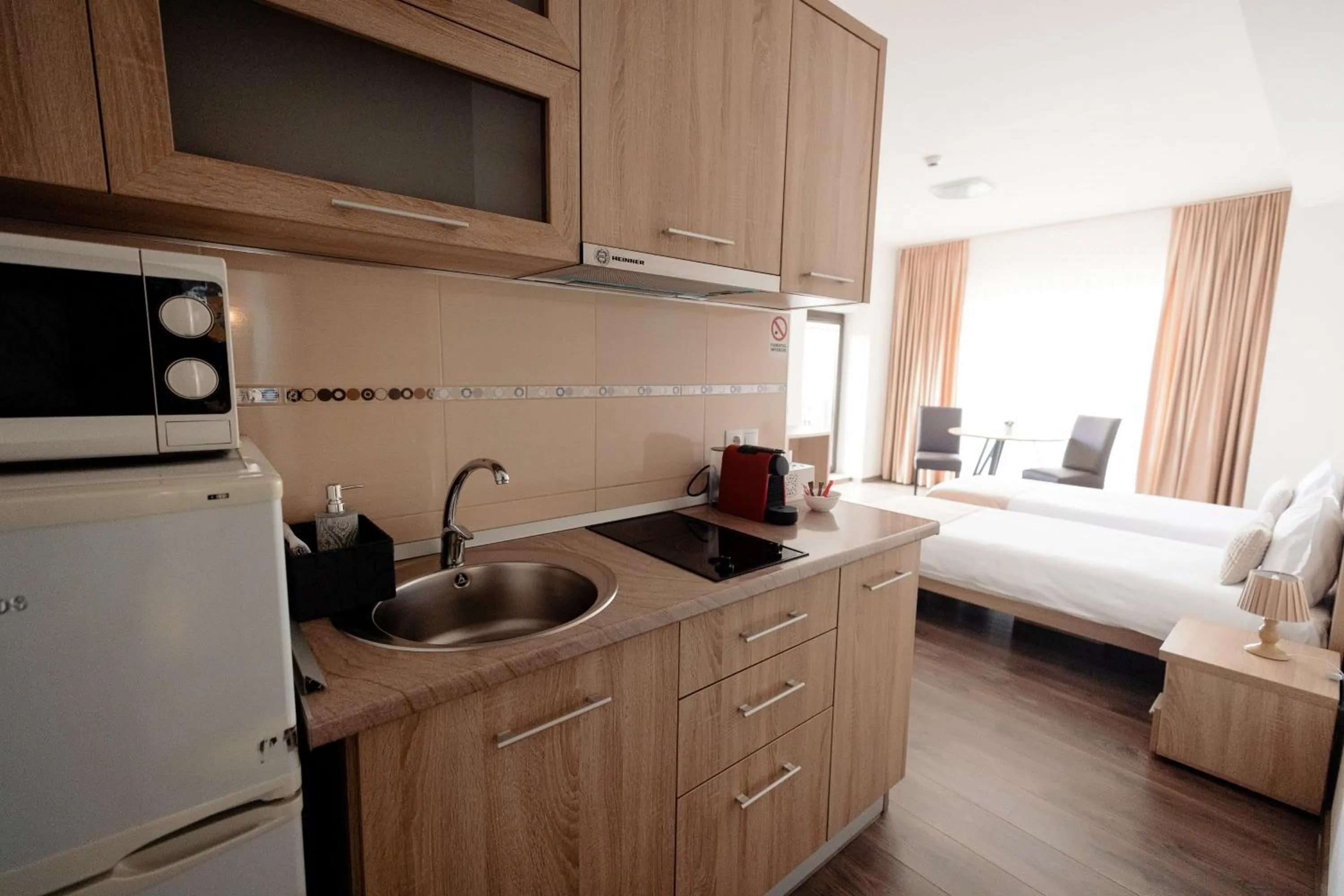 Bed in Aparthotel Punct pe i