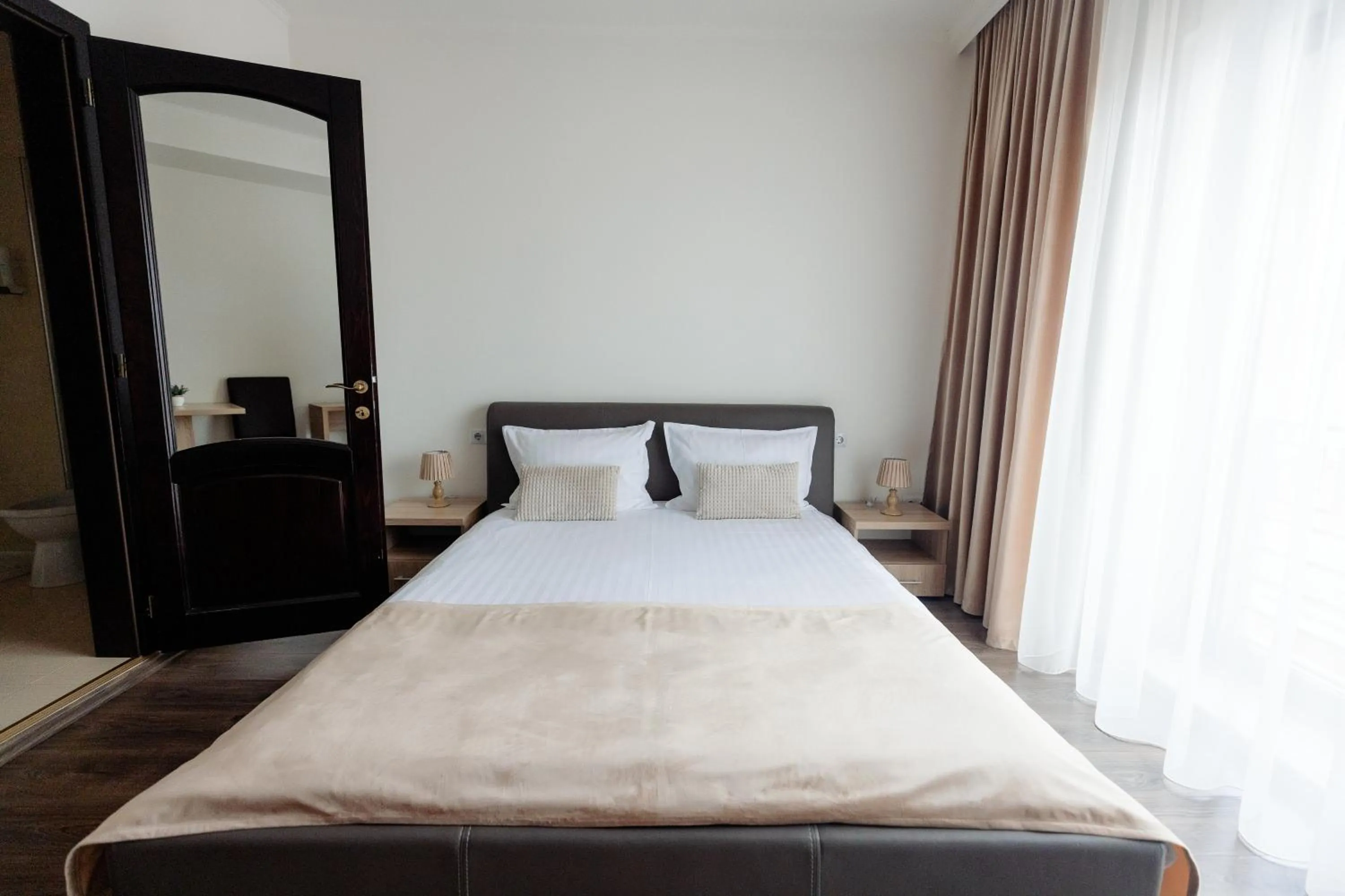 Bed in Aparthotel Punct pe i