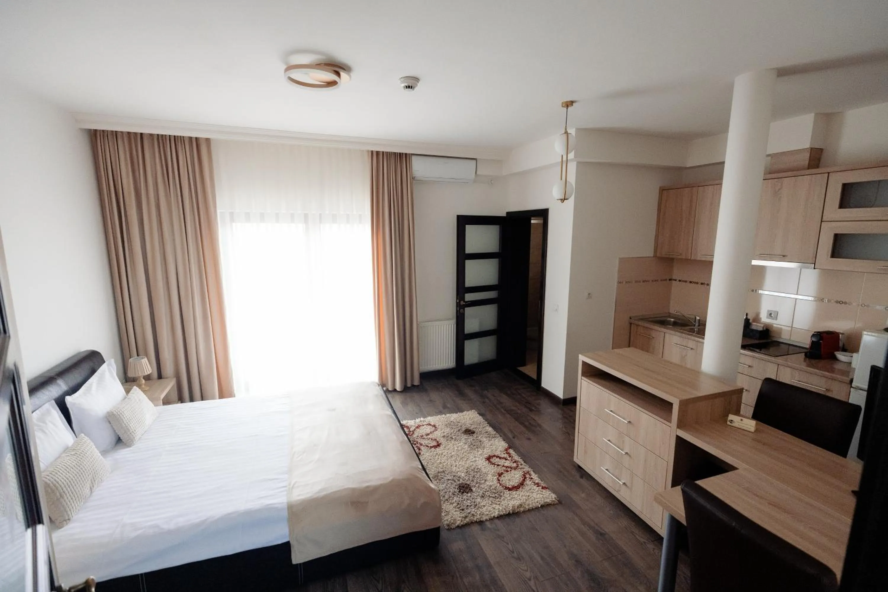 Bed in Aparthotel Punct pe i