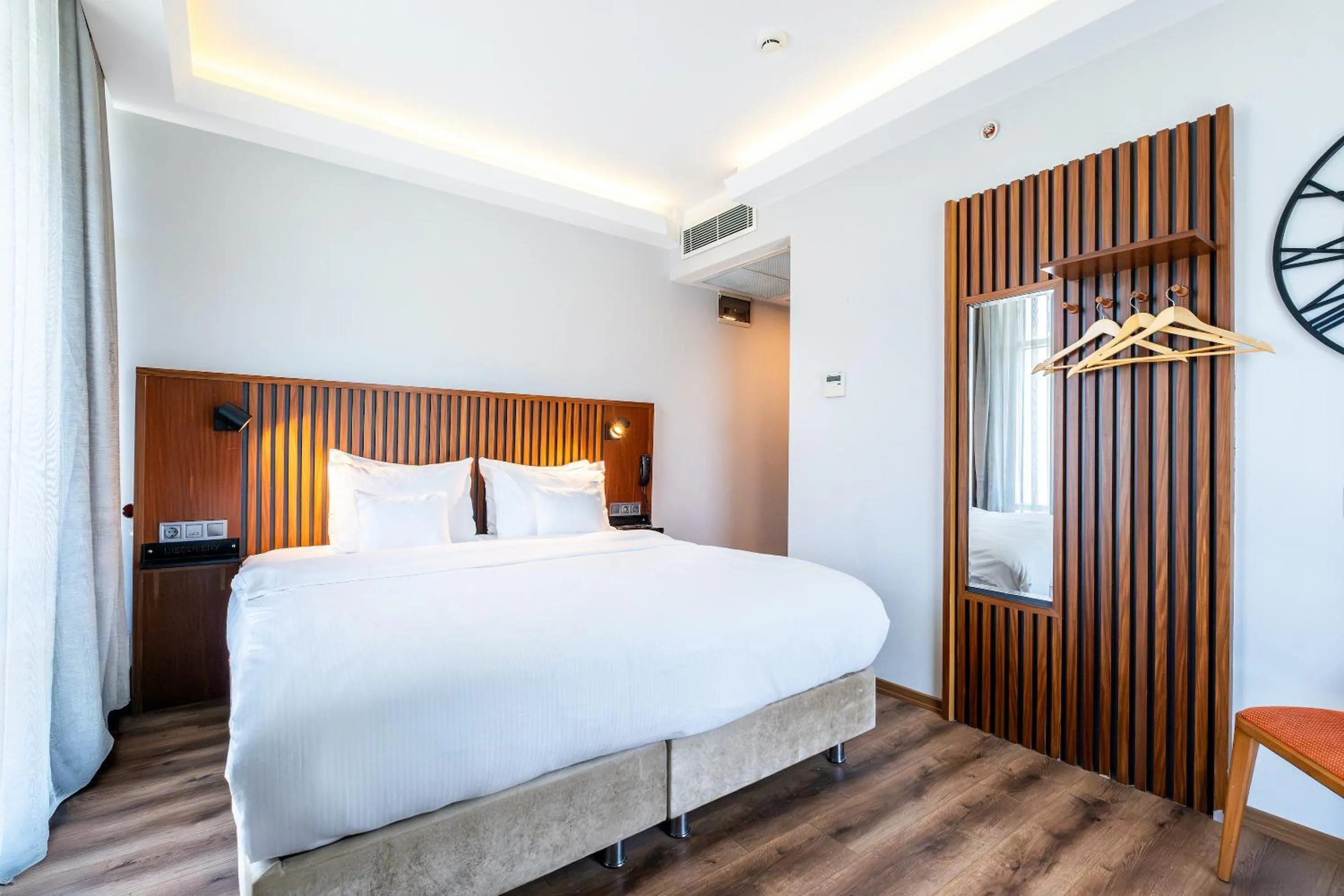 Bed in Discovery Hotel