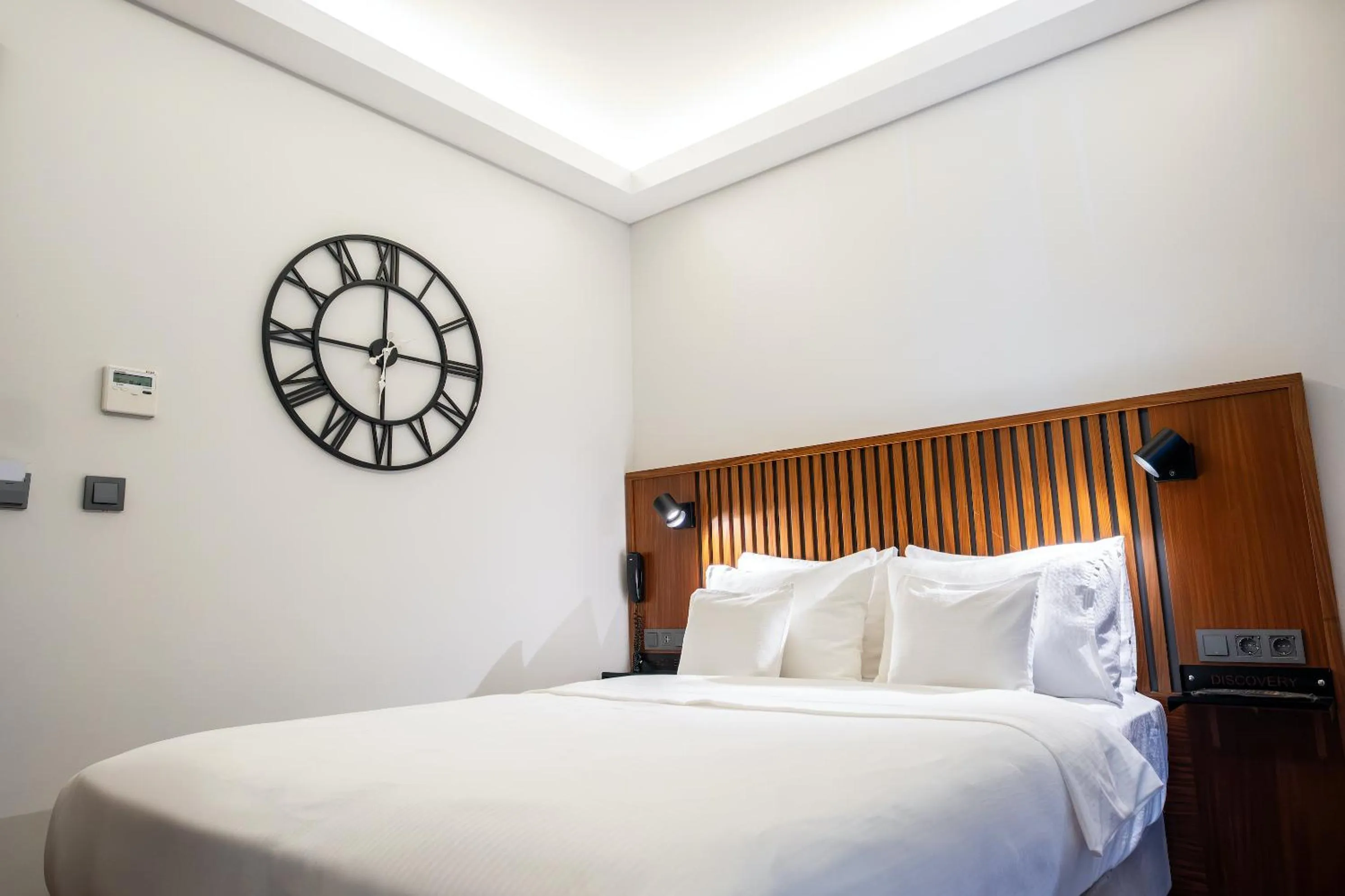 Bed in Discovery Hotel