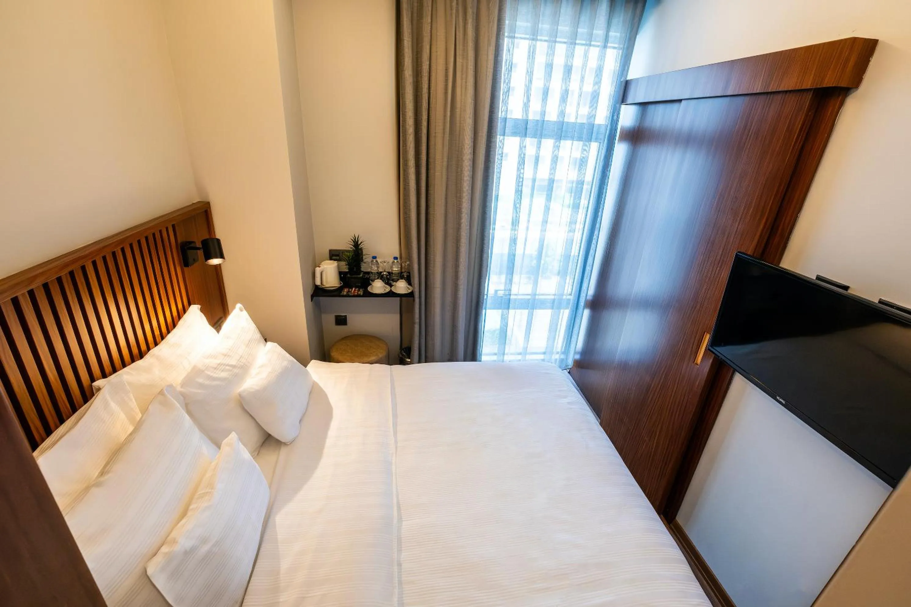 Bed in Discovery Hotel