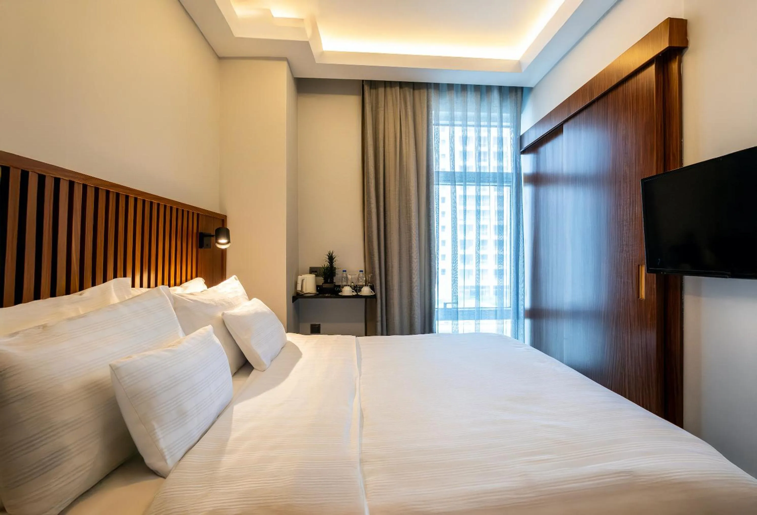 Bed in Discovery Hotel