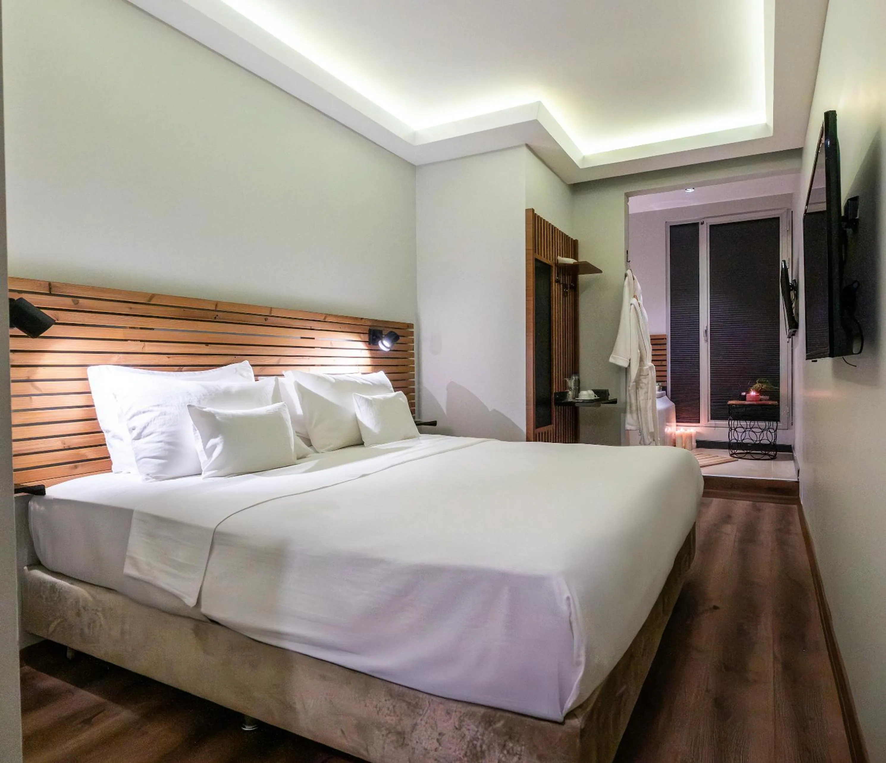 Bed in Discovery Hotel