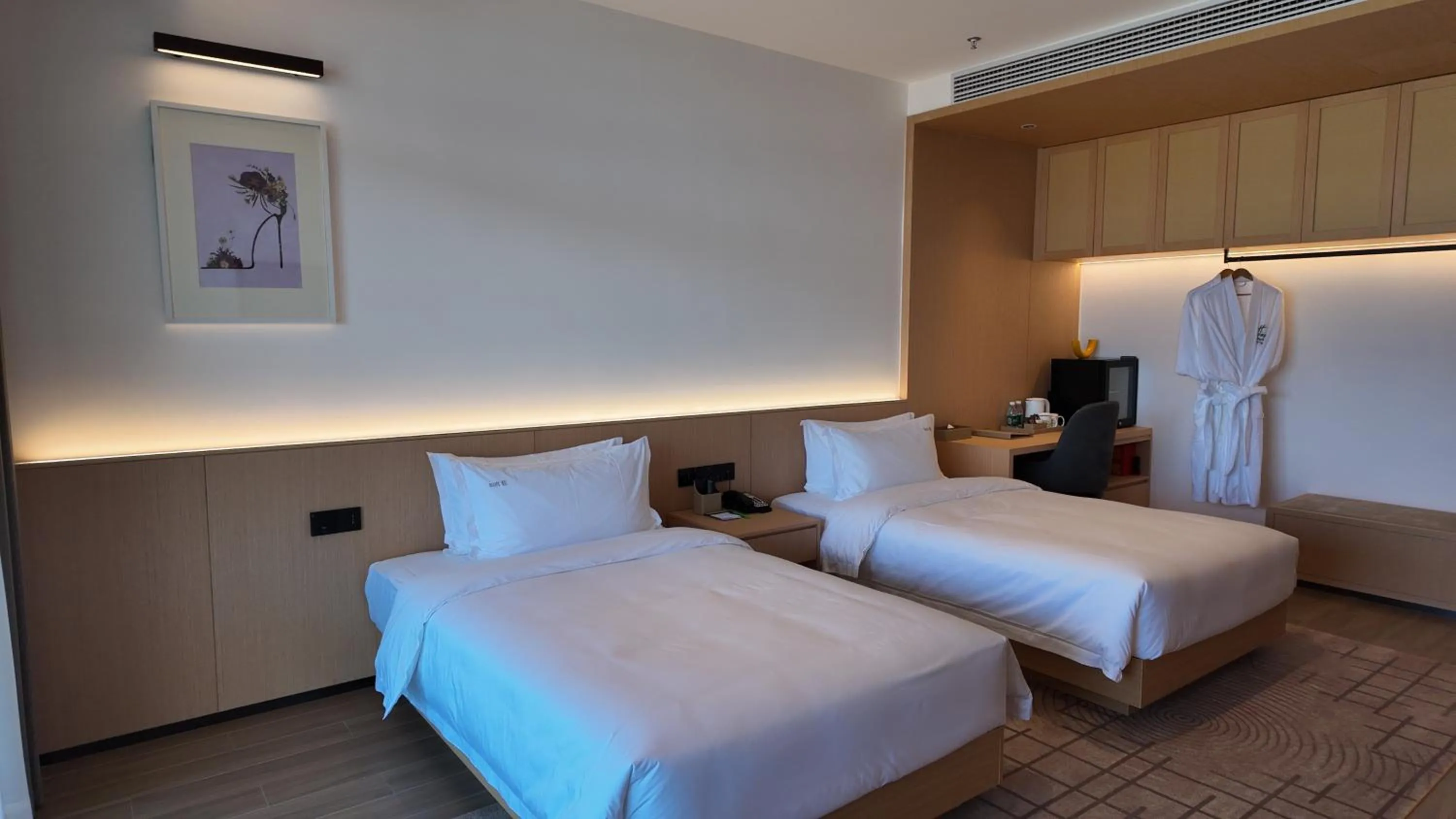 Bed in Holiday Inn Ganzhou Orchid Town by IHG