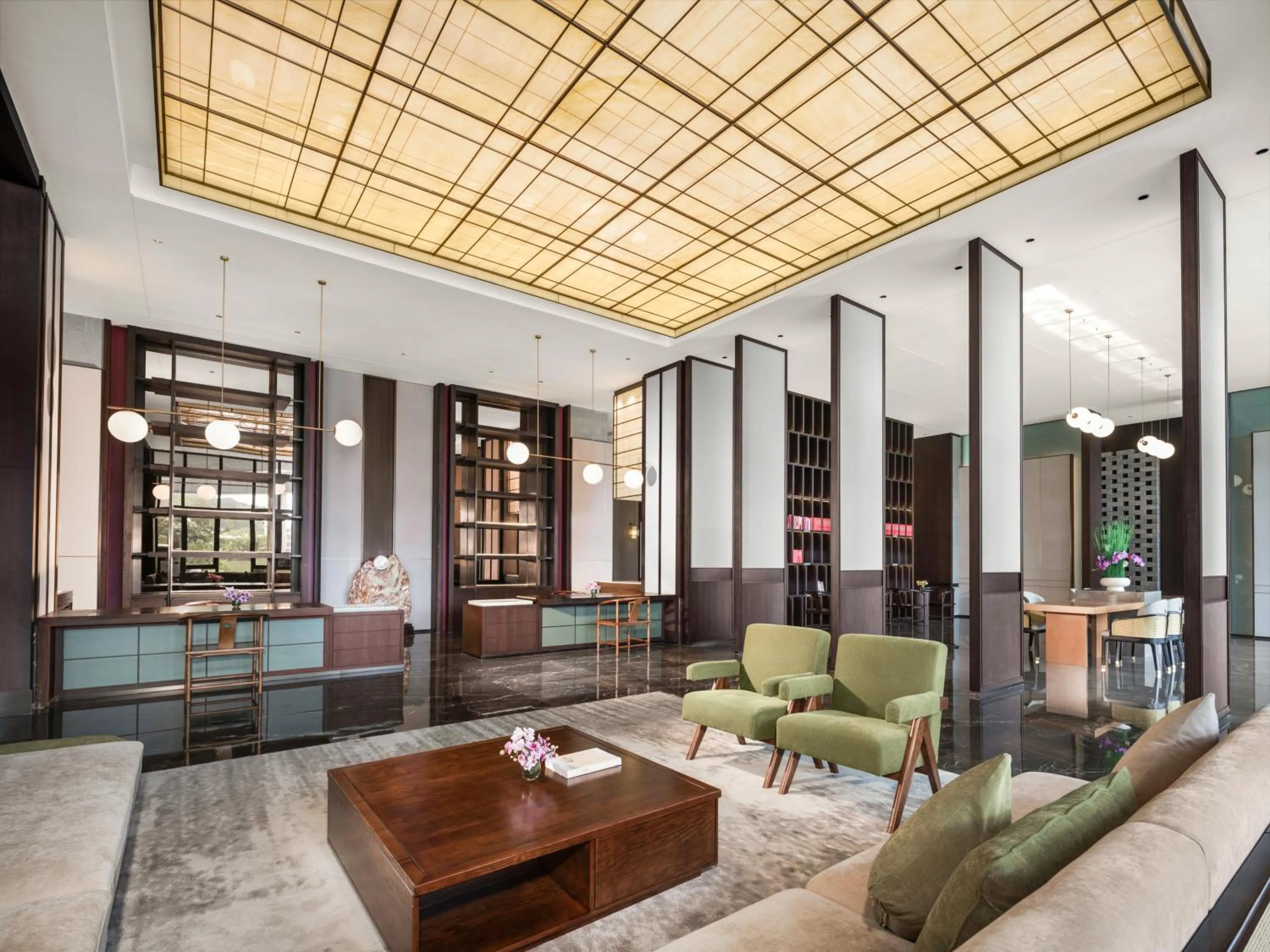 Communal lounge/ TV room in Holiday Inn Ganzhou Orchid Town by IHG