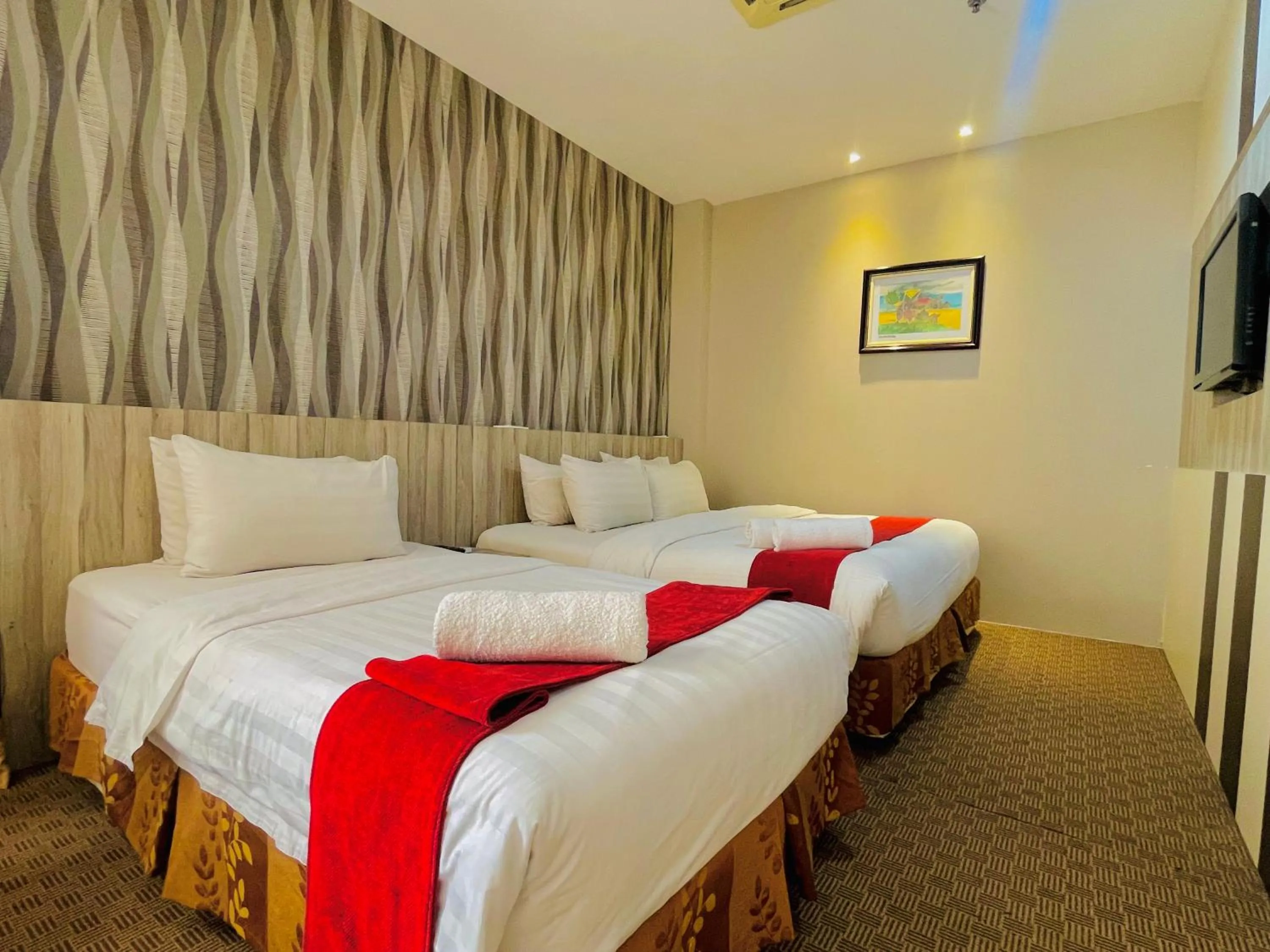 Bed in La Boss Hotel