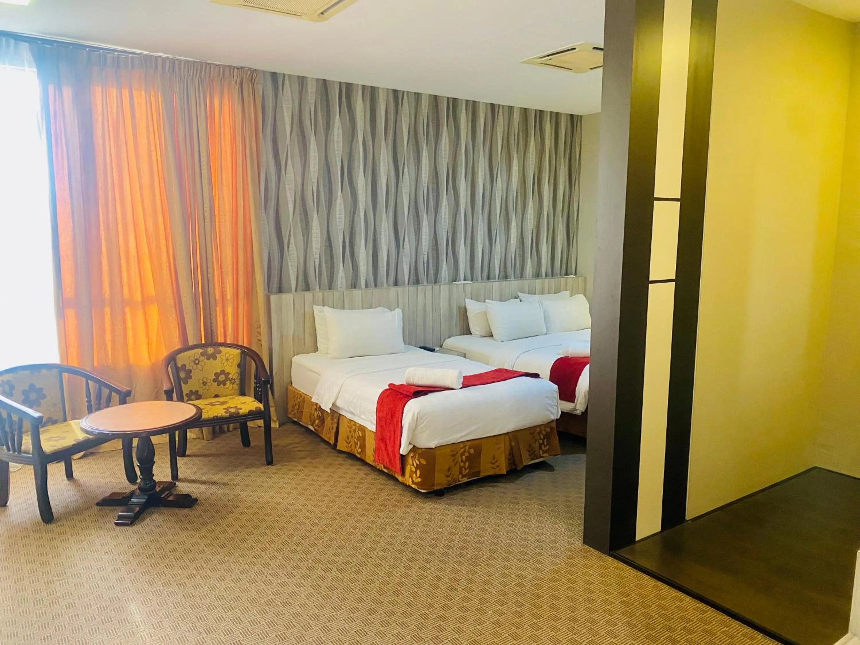 Bed in La Boss Hotel