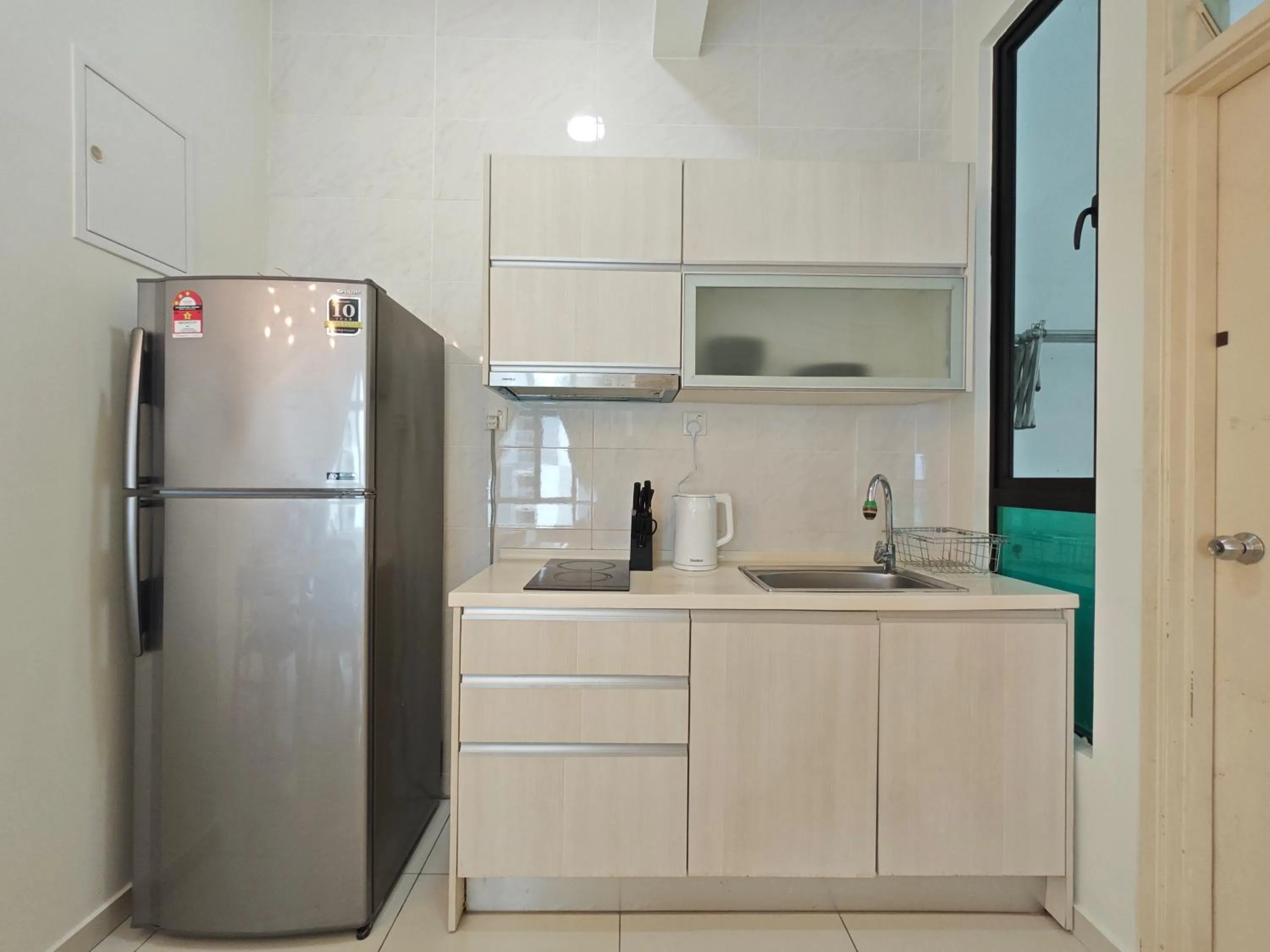 Kitchen or kitchenette in Kempas Dsummit Residences by Antlerzone