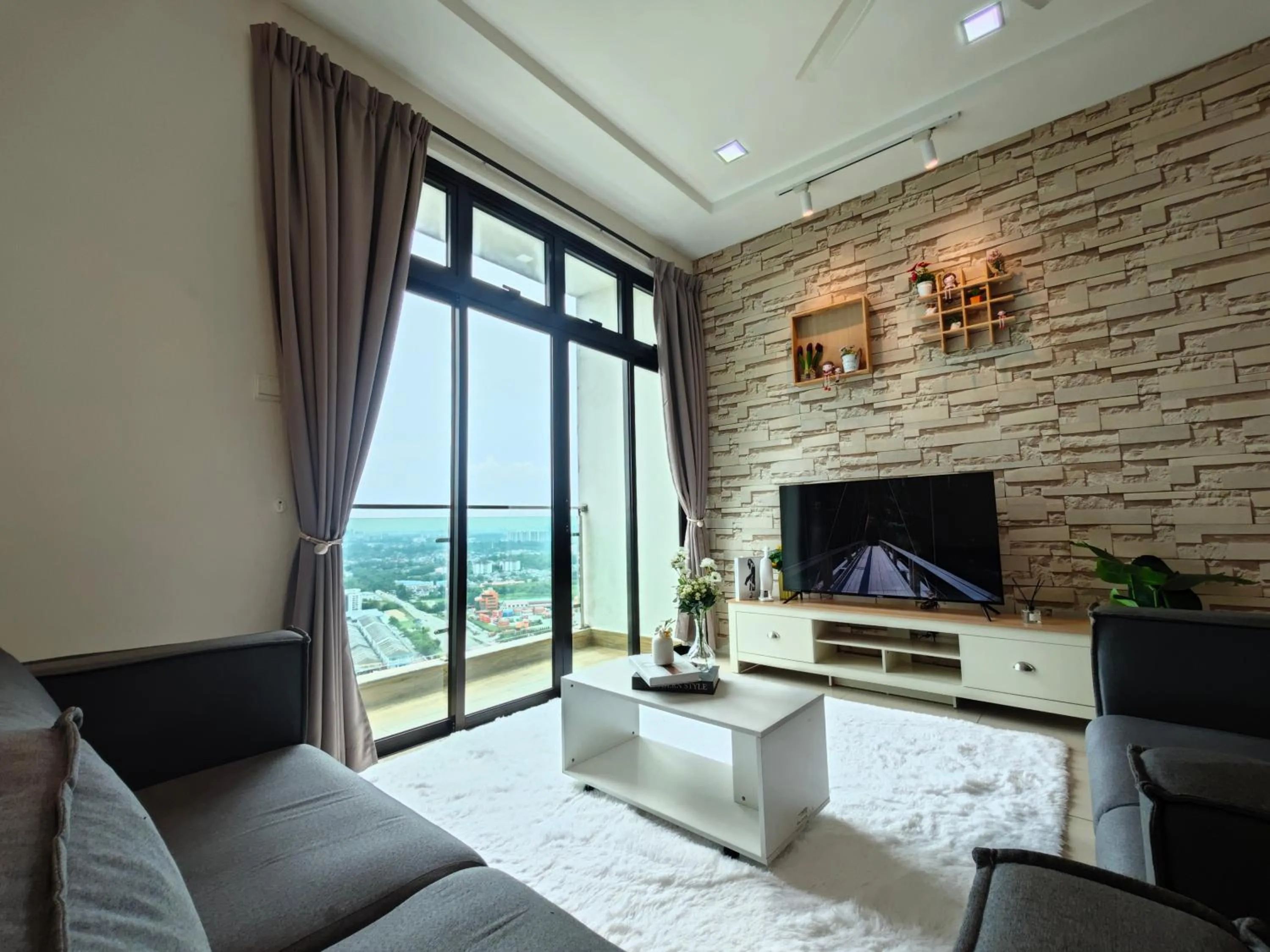 Living room in Kempas Dsummit Residences by Antlerzone