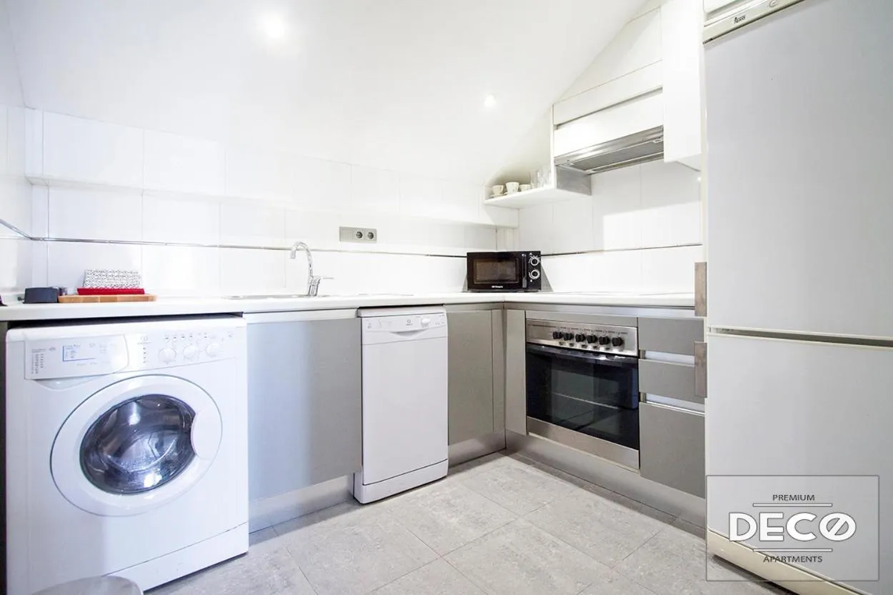 Kitchen or kitchenette in Apartamentos Conde Duque Decó