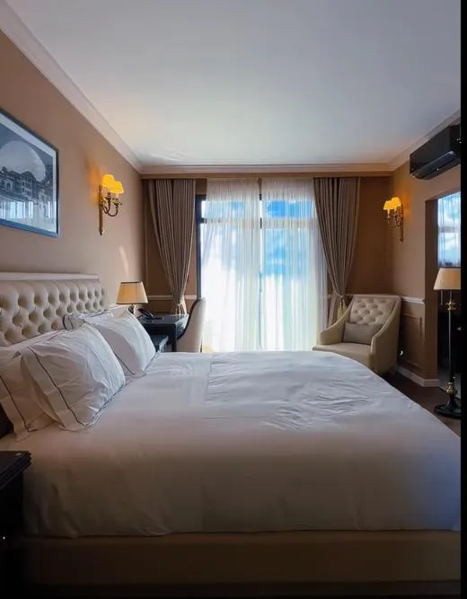 Bed in Hôtel Colbert Palace