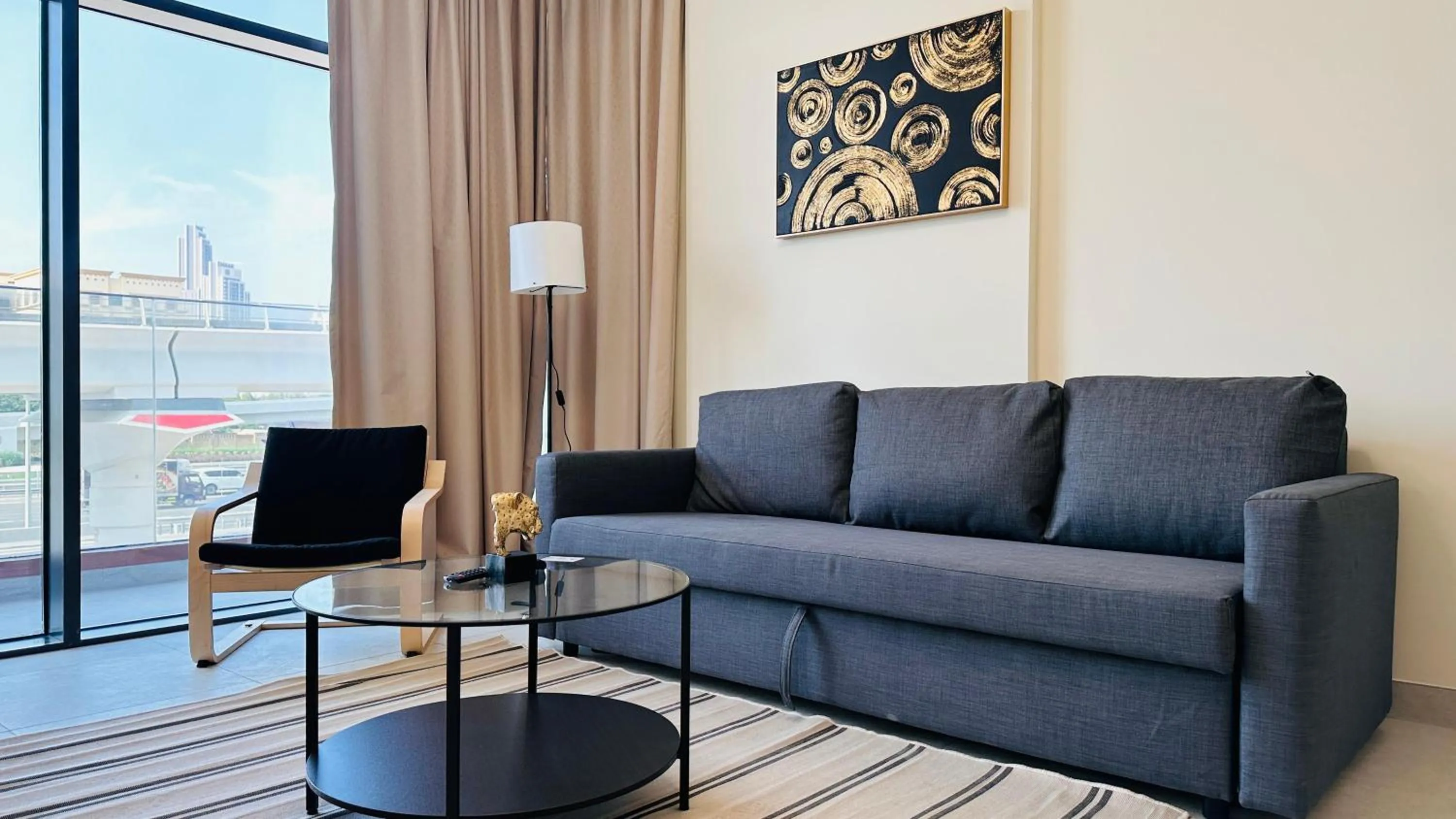 Seating area in Sunday Sheikh Zayed Road Concord Tower by Belvilla