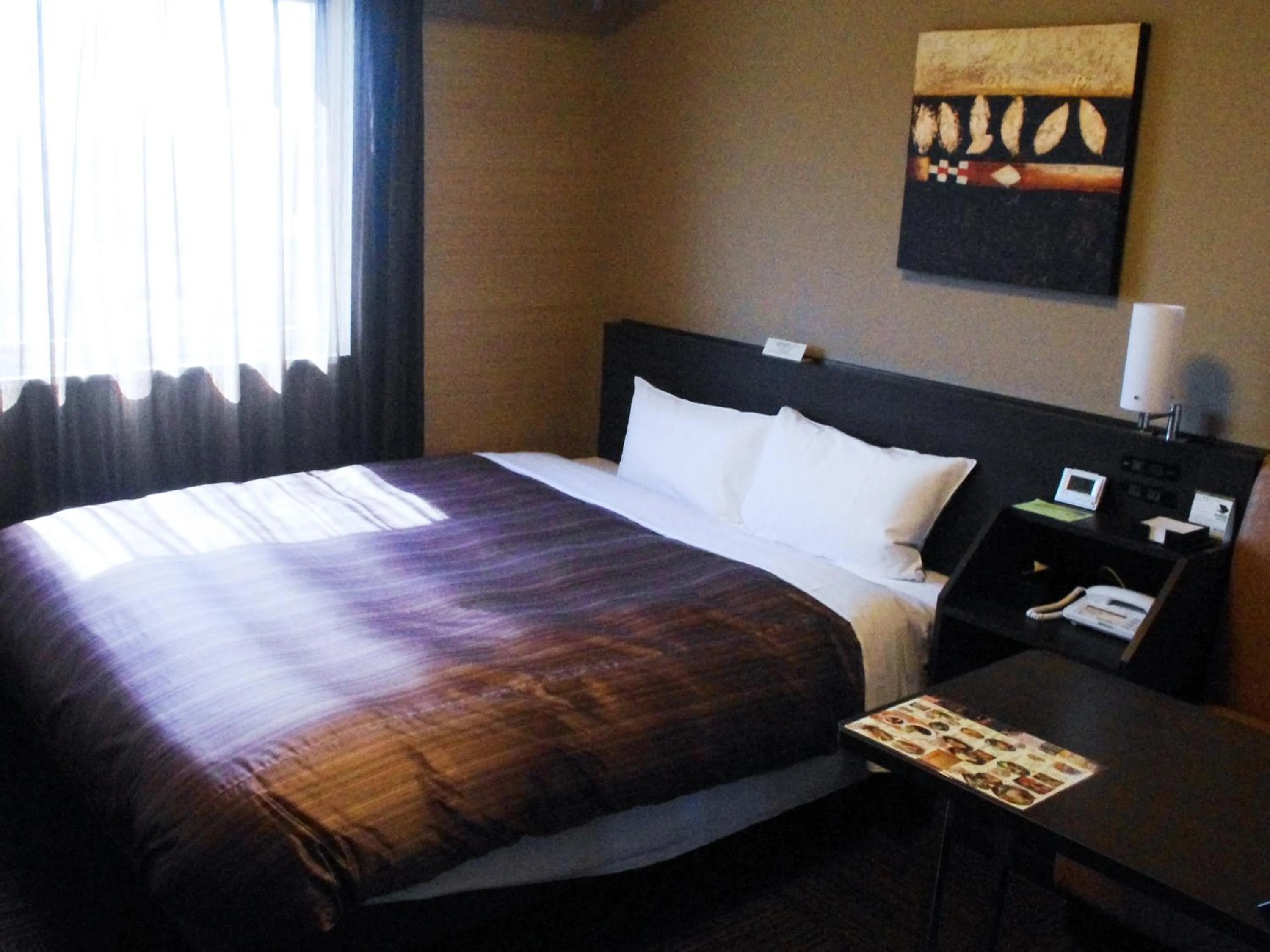 Photo of the whole room, Bed in Hotel Route Inn Hamamatsu Dealer Dori