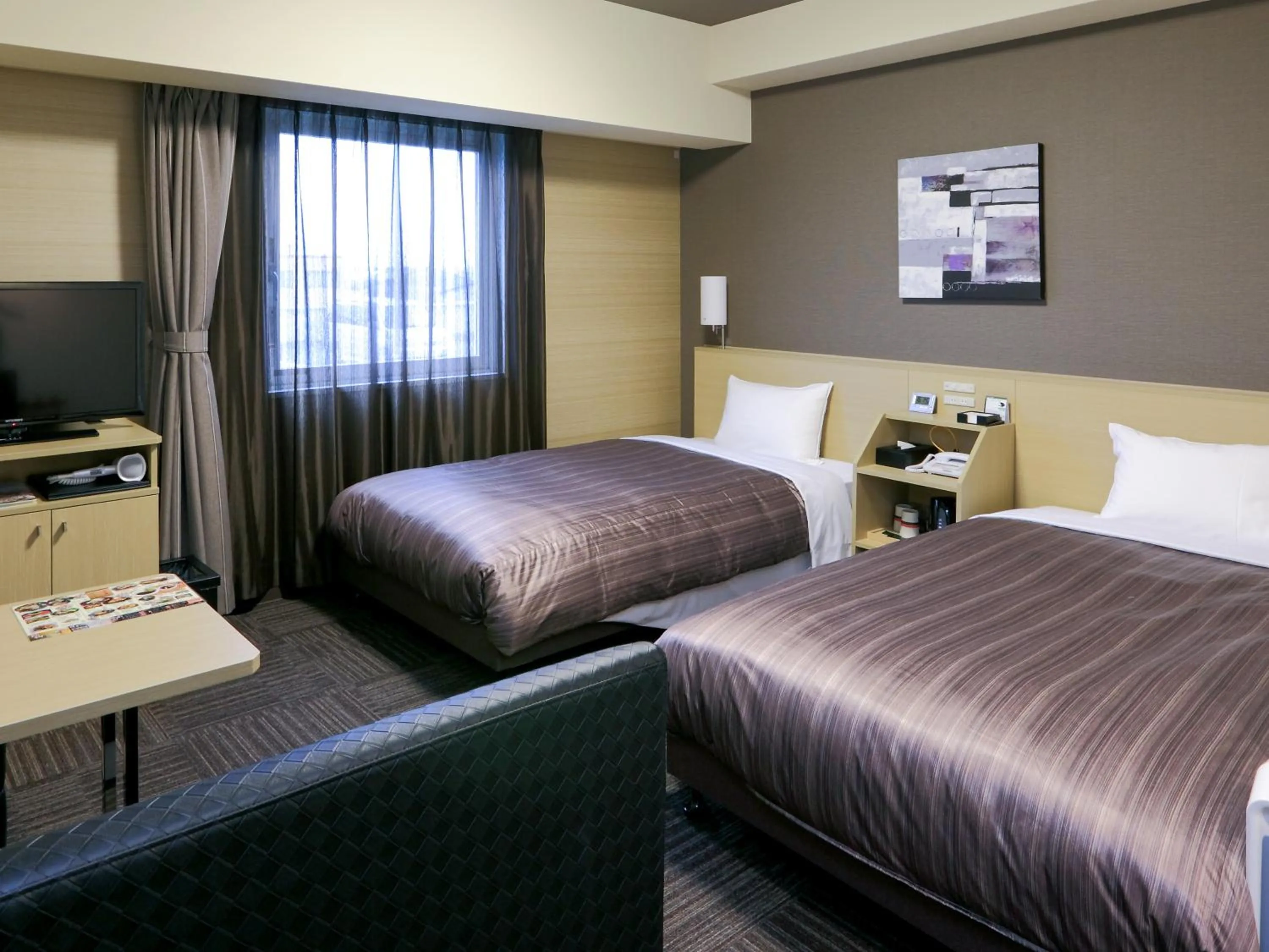 Photo of the whole room, Bed in Hotel Route Inn Hamamatsu Dealer Dori