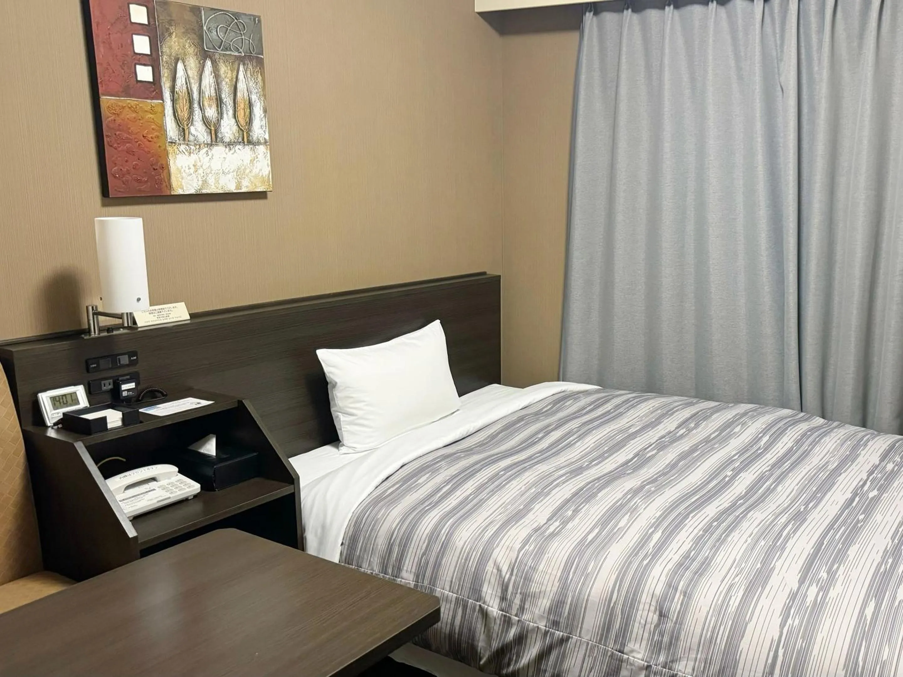 Photo of the whole room, Bed in Hotel Route Inn Hitachinaka