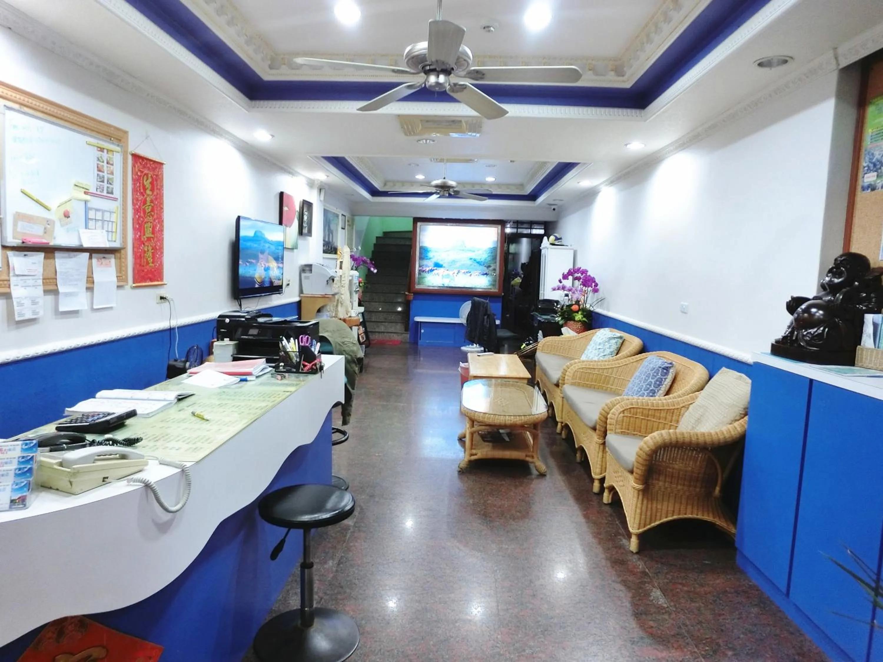 Communal lounge/ TV room in Xing Ji Hotel