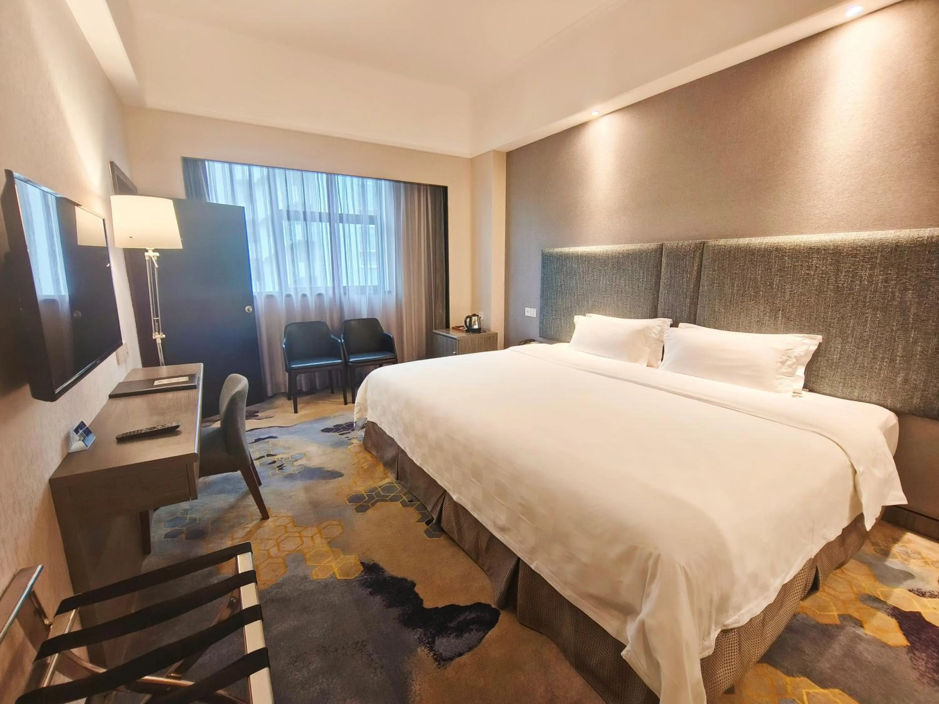 Bed in Shenzhen Lido Hotel