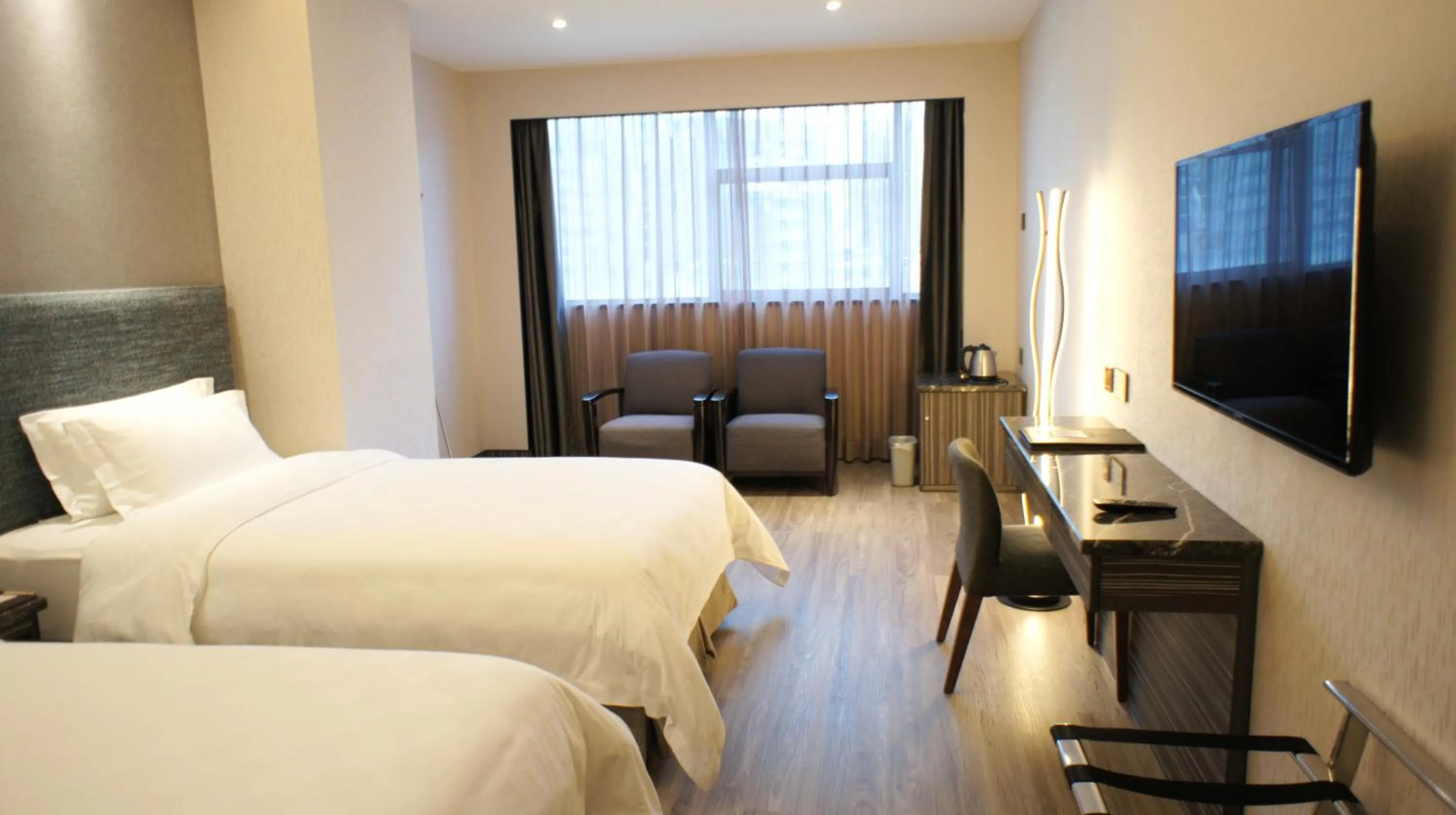 Bed in Shenzhen Lido Hotel