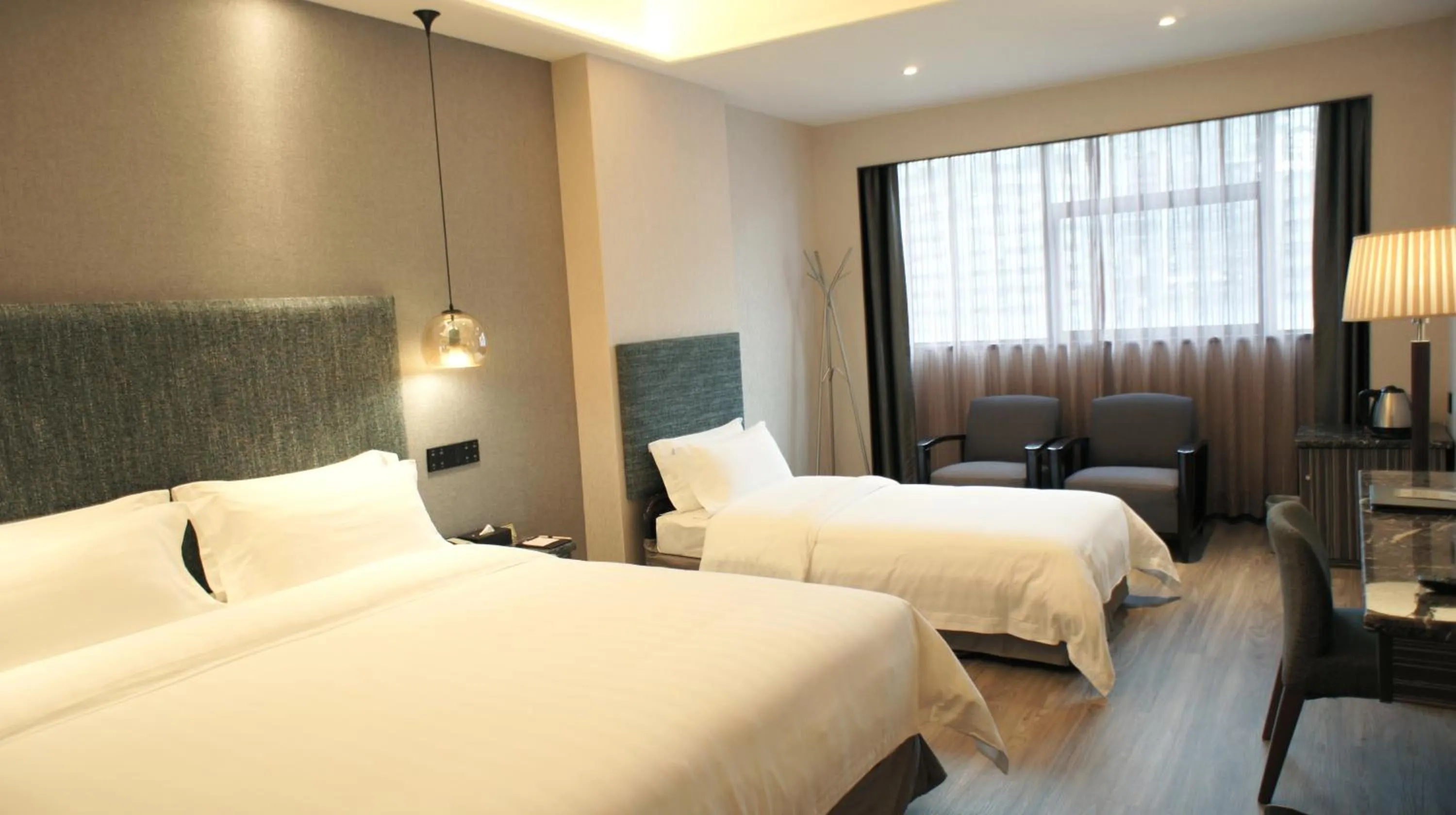 Bed in Shenzhen Lido Hotel