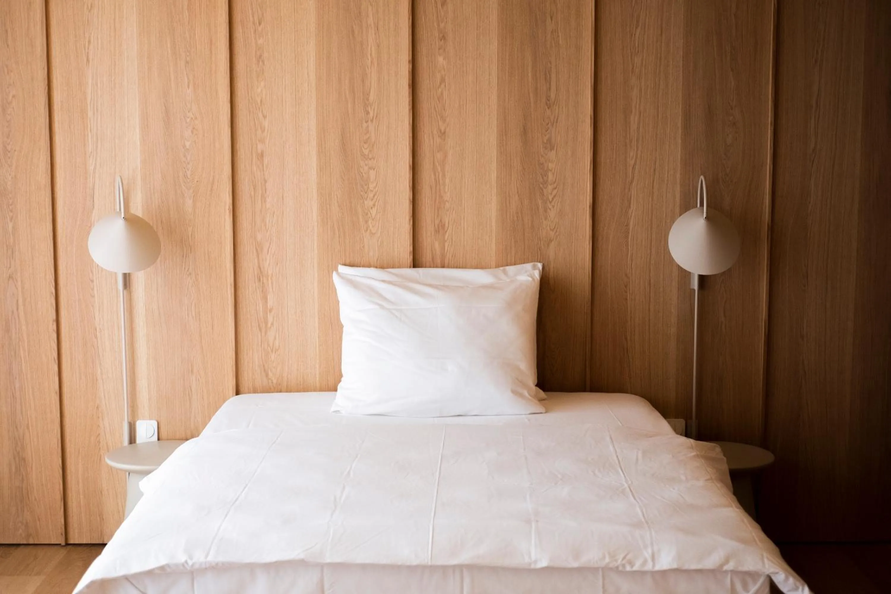 Bed in Das Kaya Hotel Stuttgart Airport Messe