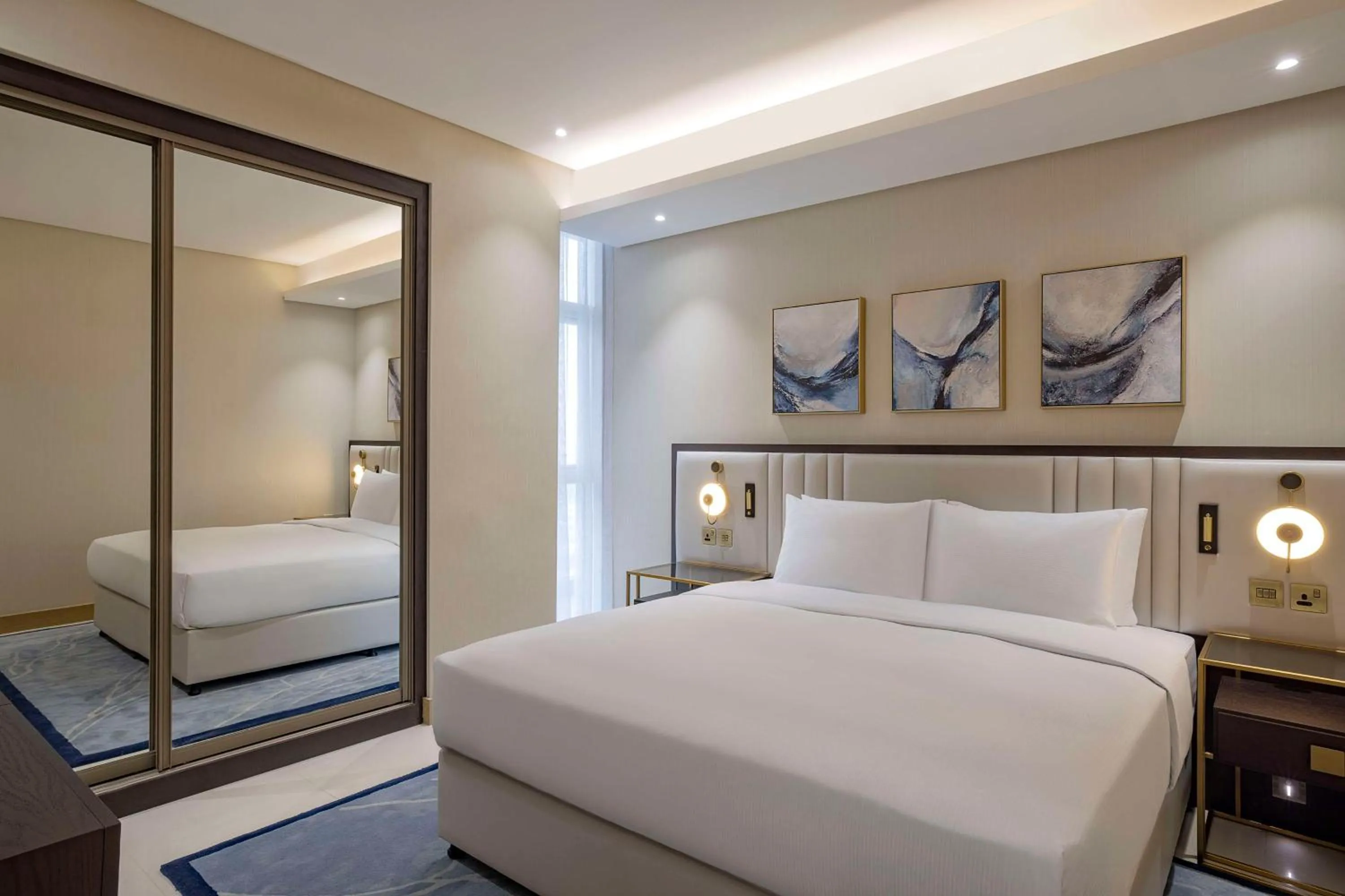 Bed in Hilton Bahrain City Centre Hotel & Residences