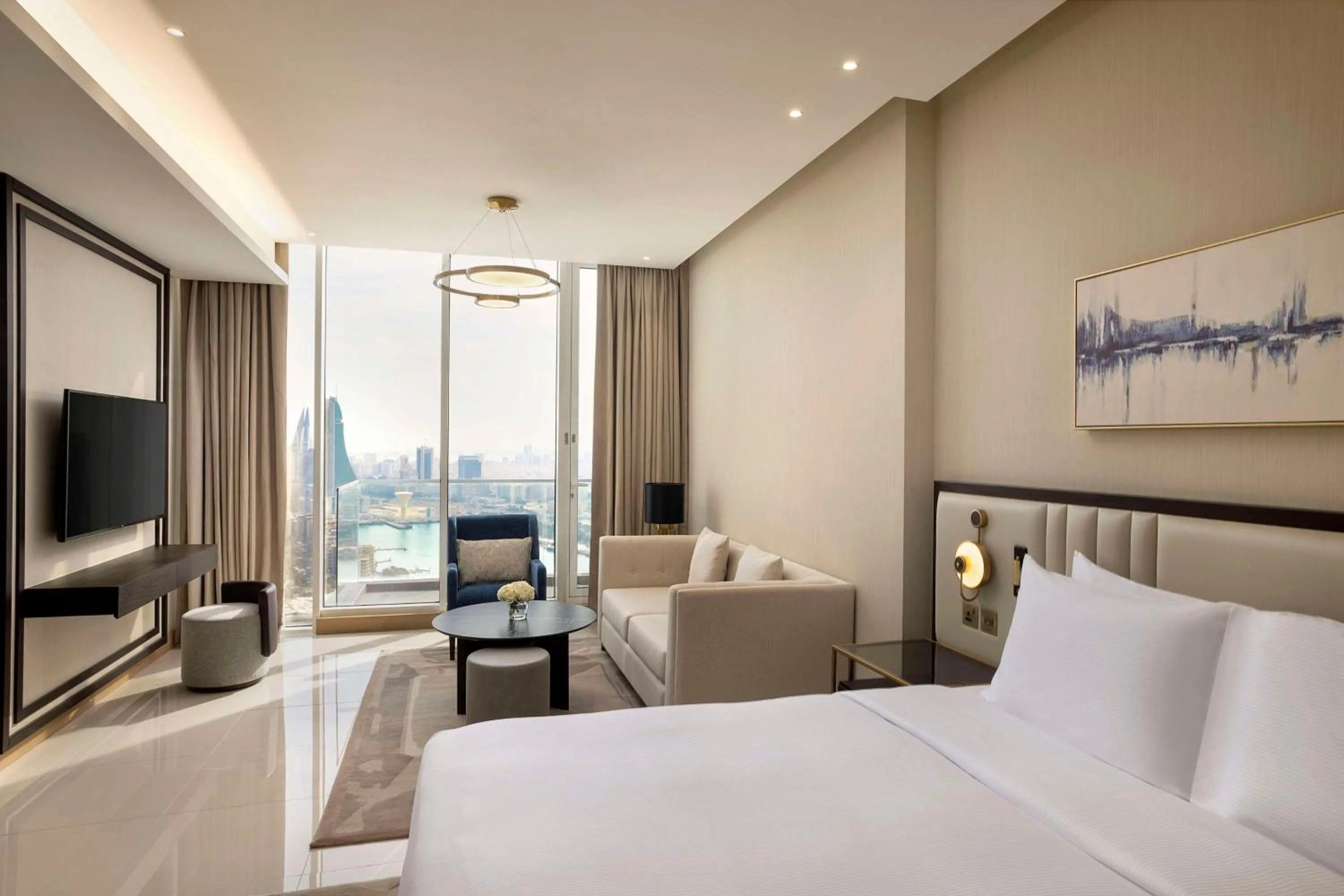 Living room, Bed in Hilton Bahrain City Centre Hotel & Residences