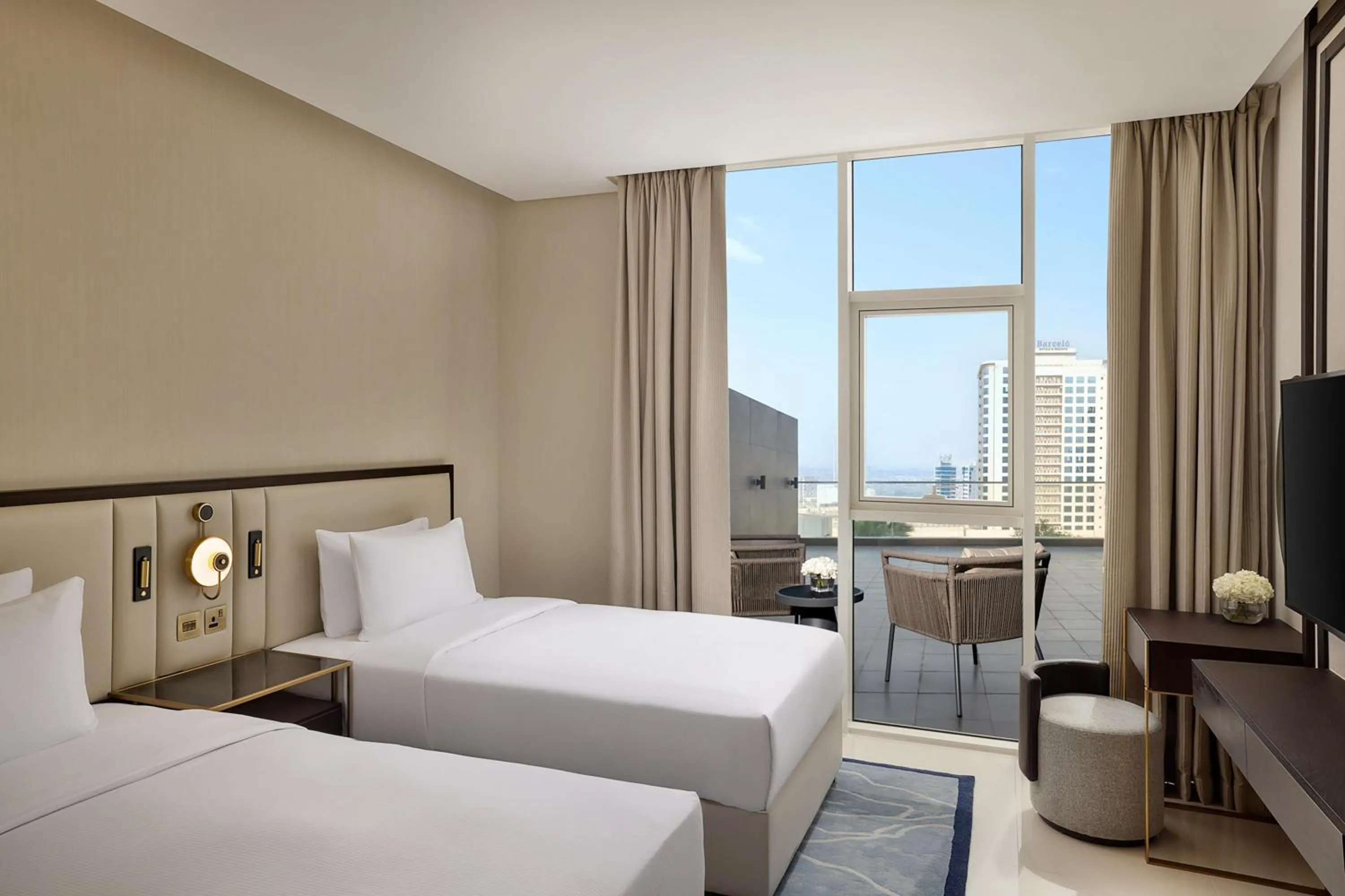 Bed in Hilton Bahrain City Centre Hotel & Residences