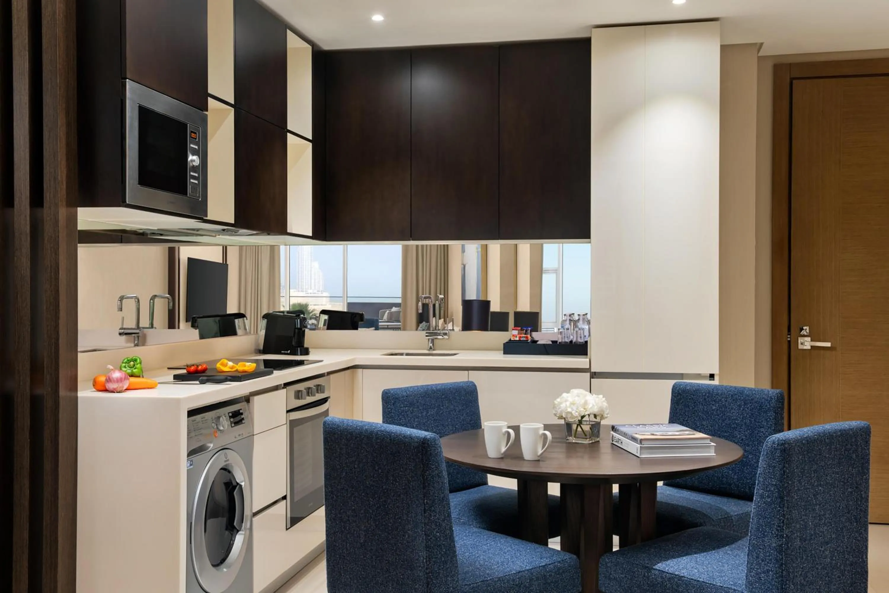 Kitchen or kitchenette in Hilton Bahrain City Centre Hotel & Residences