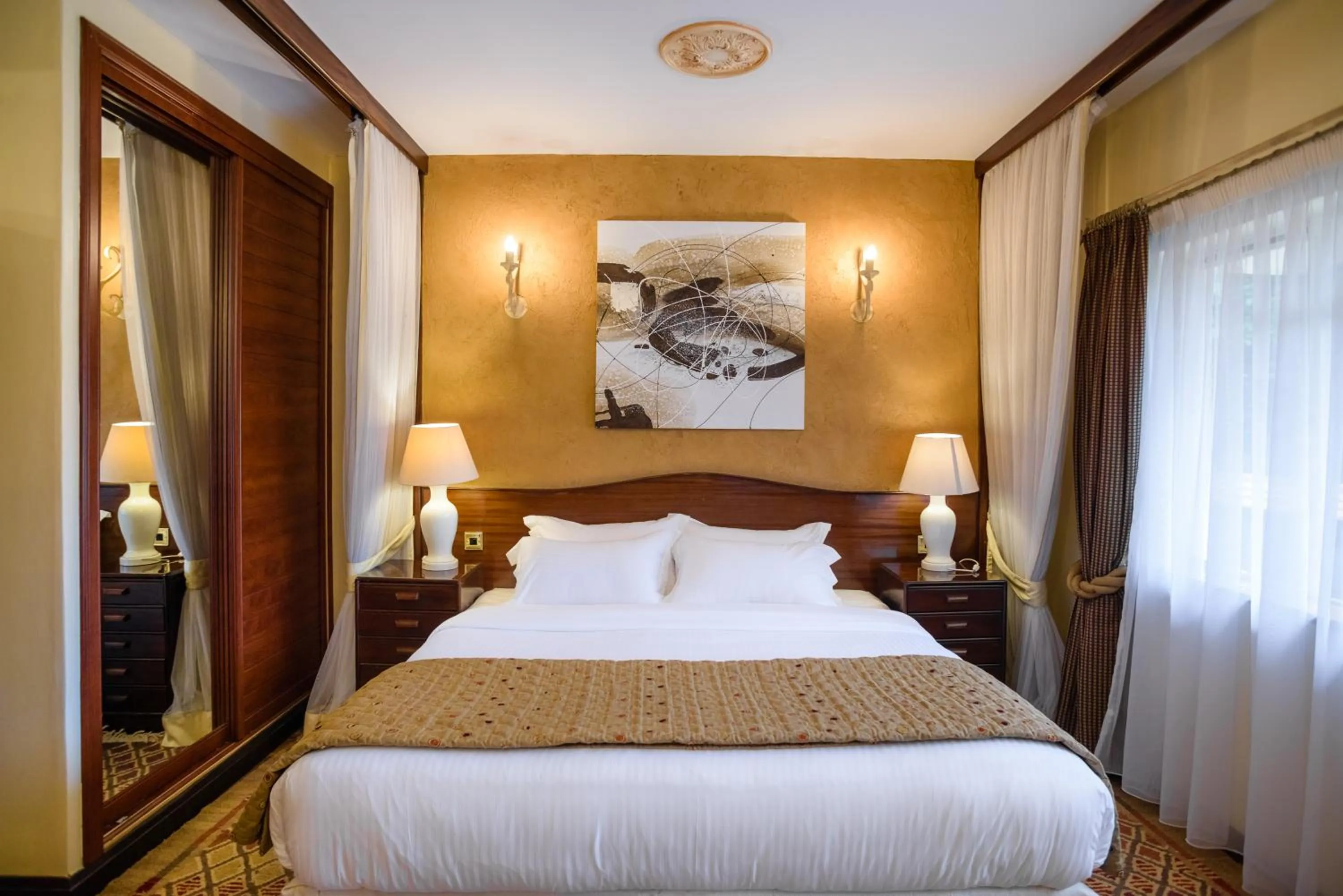 Bed in Mimosa Court Apartments