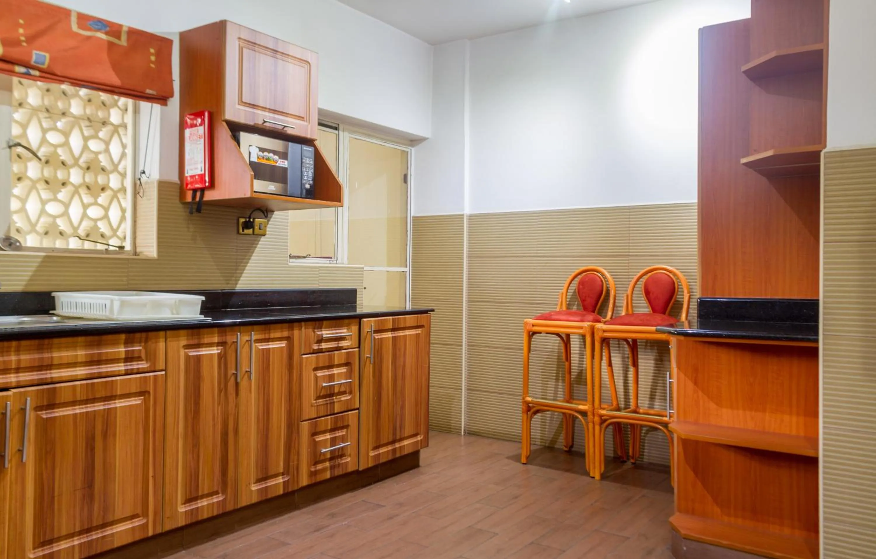 Kitchen or kitchenette in Mimosa Court Apartments
