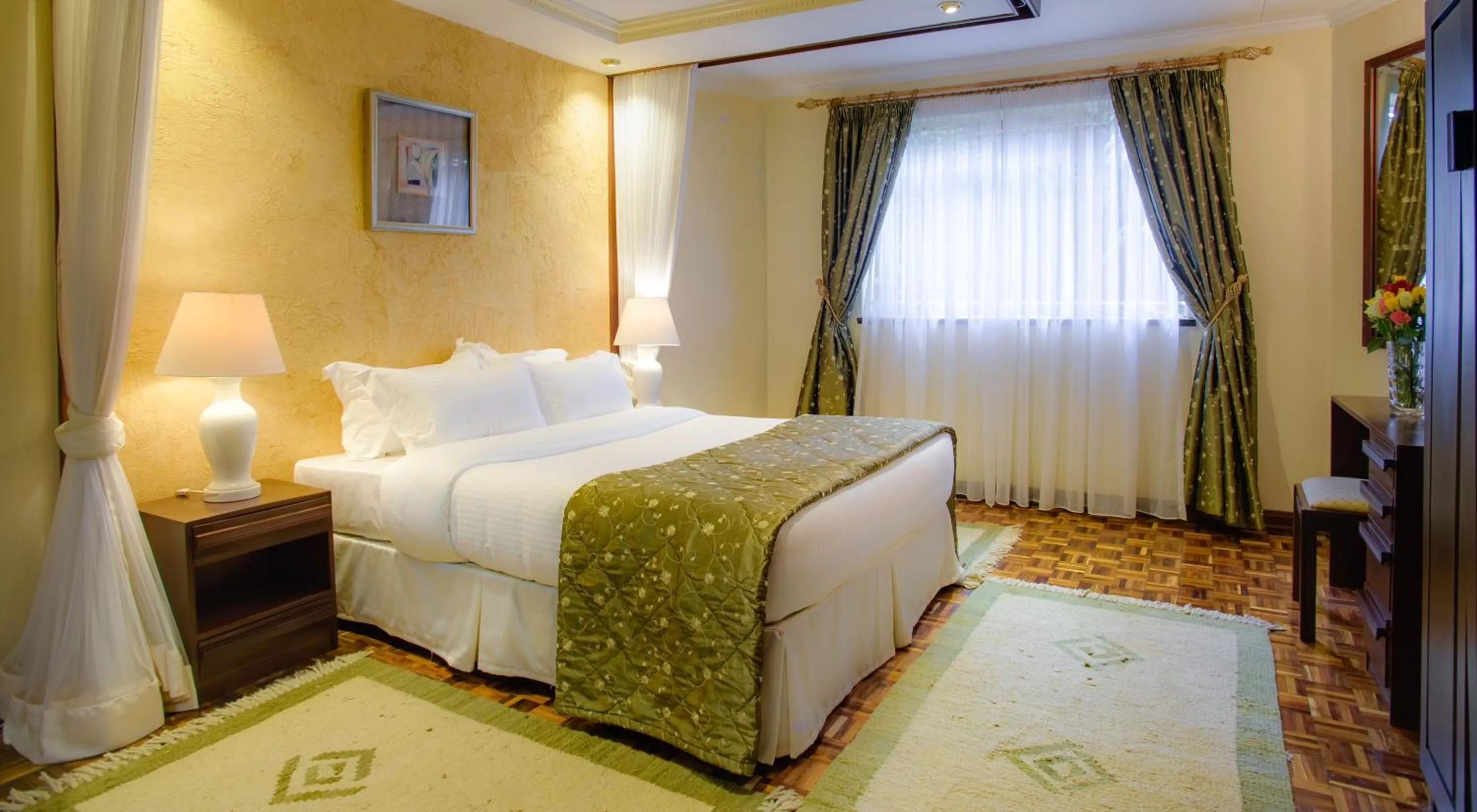 Bed in Mimosa Court Apartments