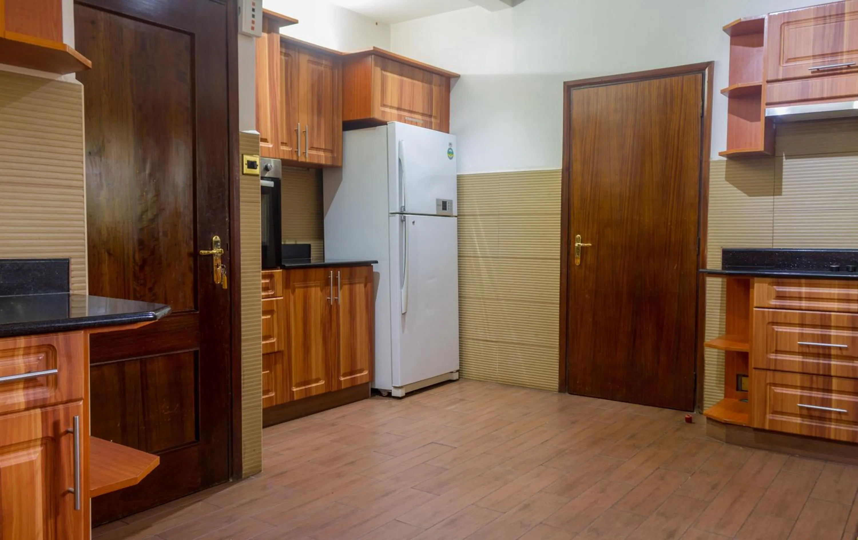 Kitchen or kitchenette in Mimosa Court Apartments