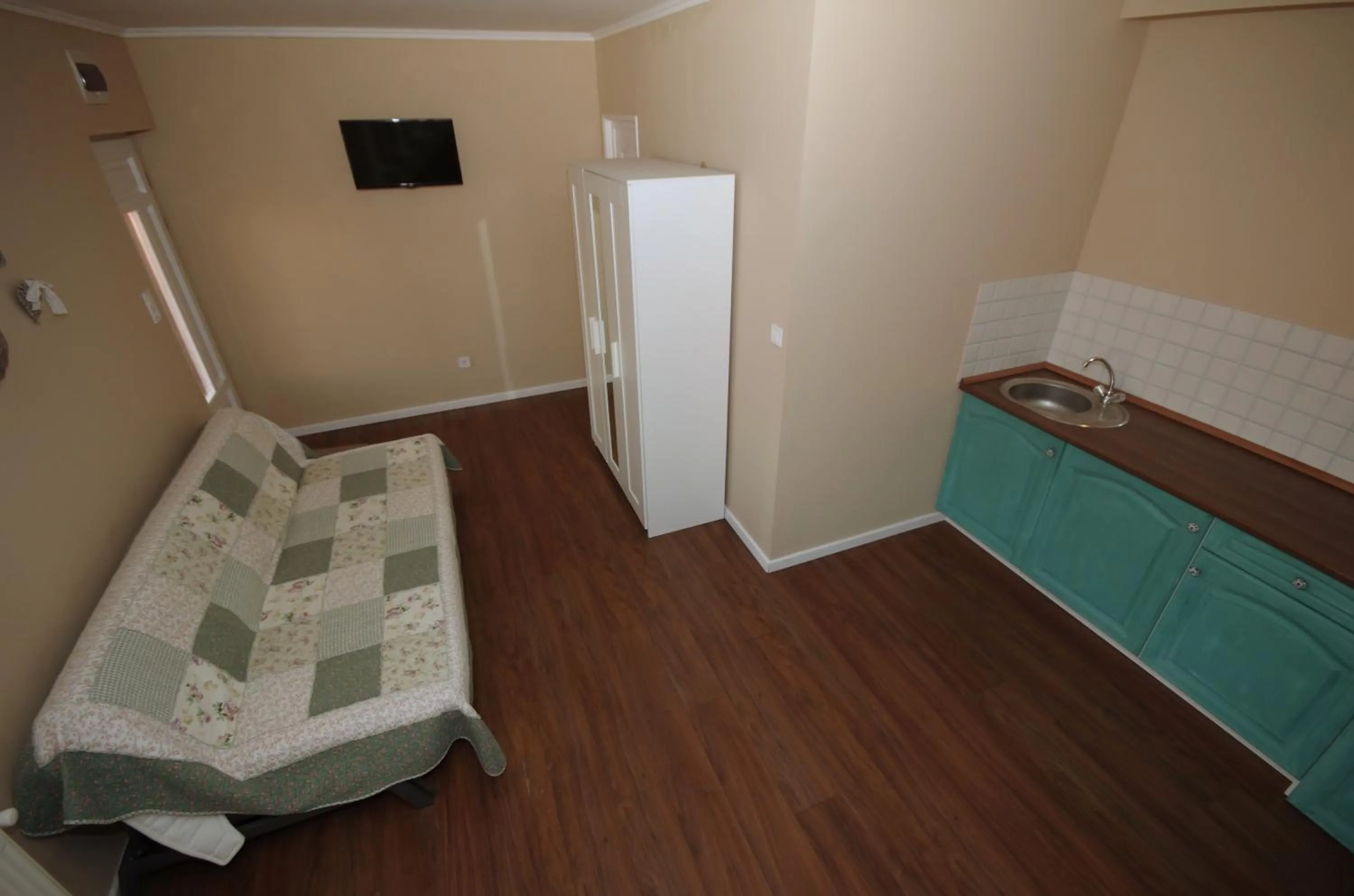 Kitchen or kitchenette, Bed in Guest House Romantika Panzio