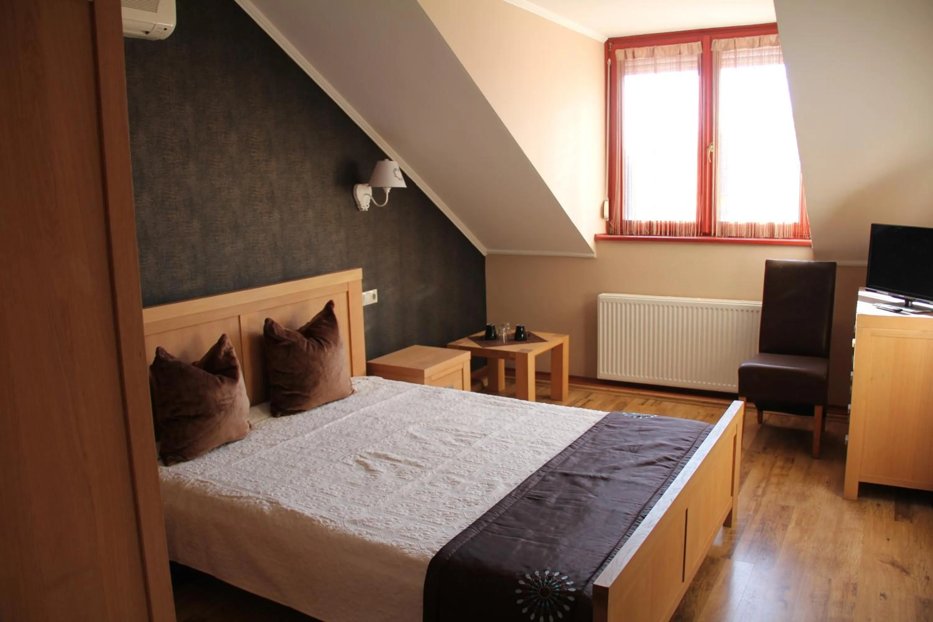 Bed in Guest House Romantika Panzio