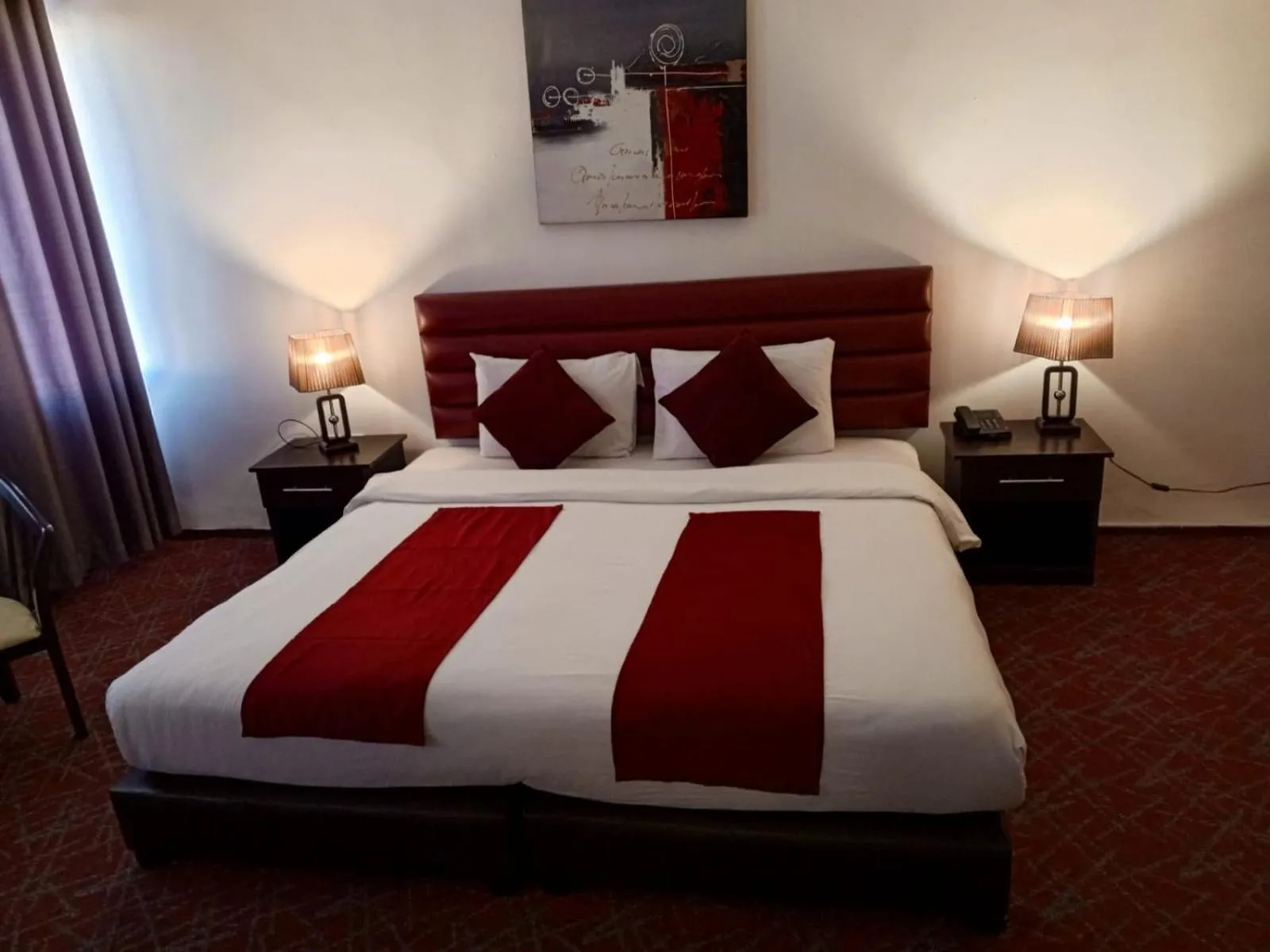 Bed in The Signature Hotel Amman