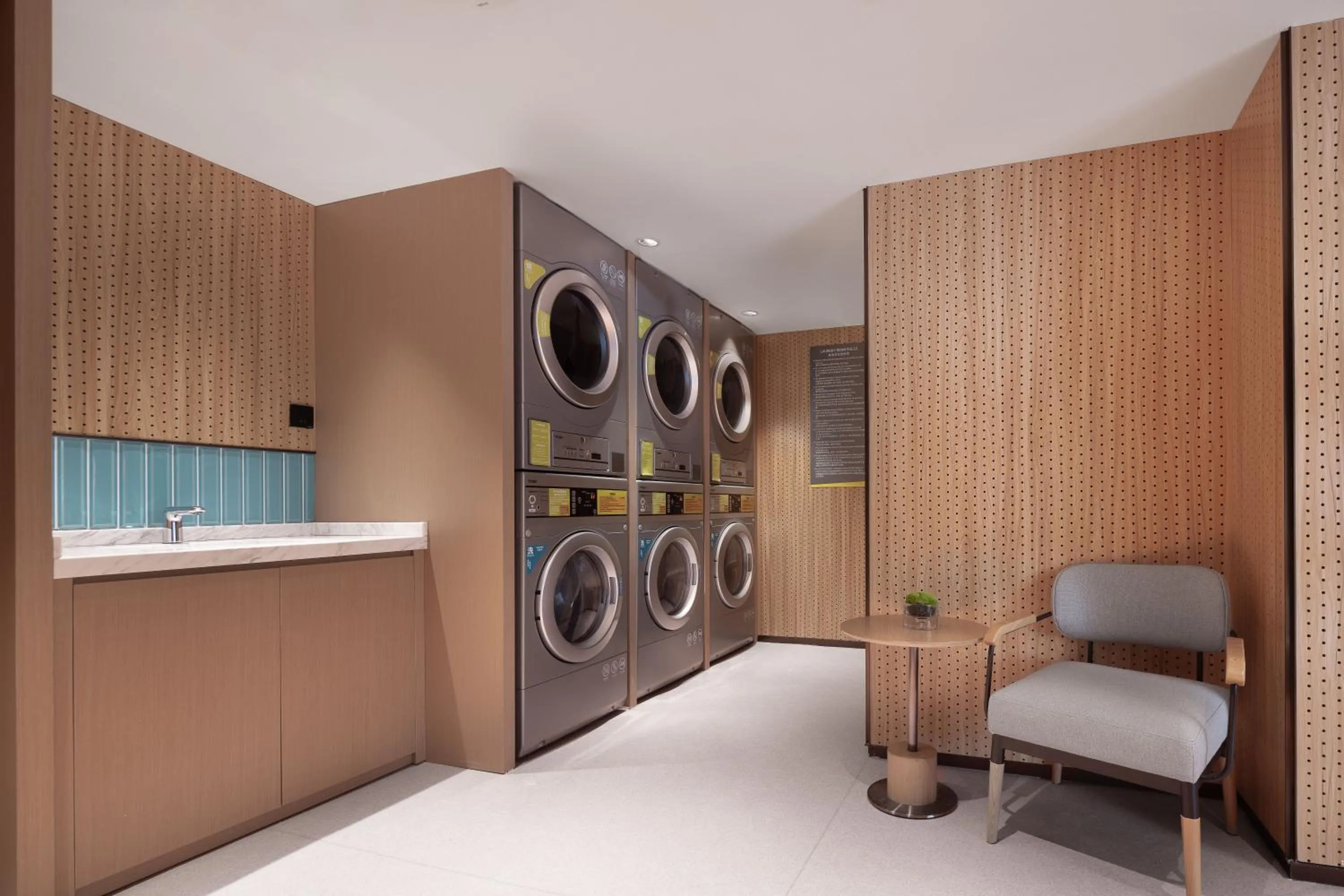 washing machine in Home2 Suite by Hilton Harbin Central Street