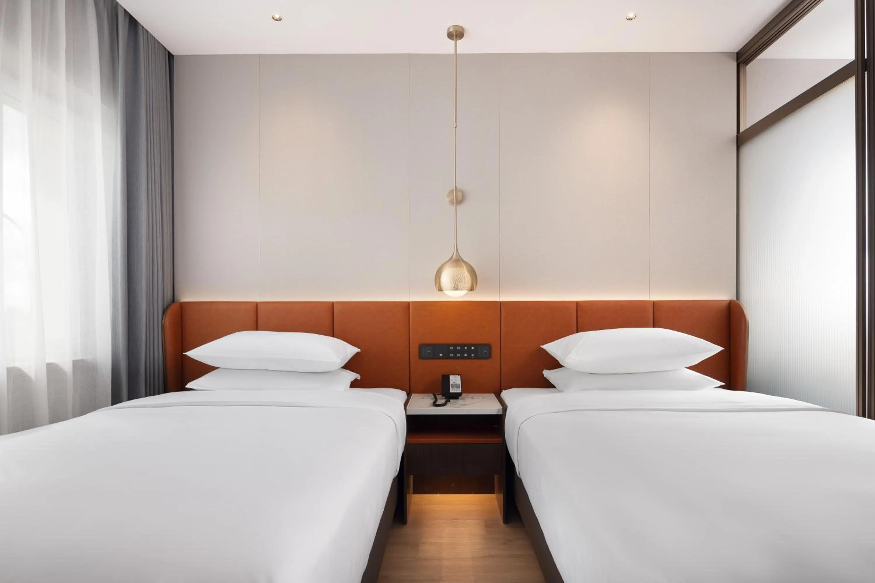 Bed in Home2 Suite by Hilton Harbin Central Street