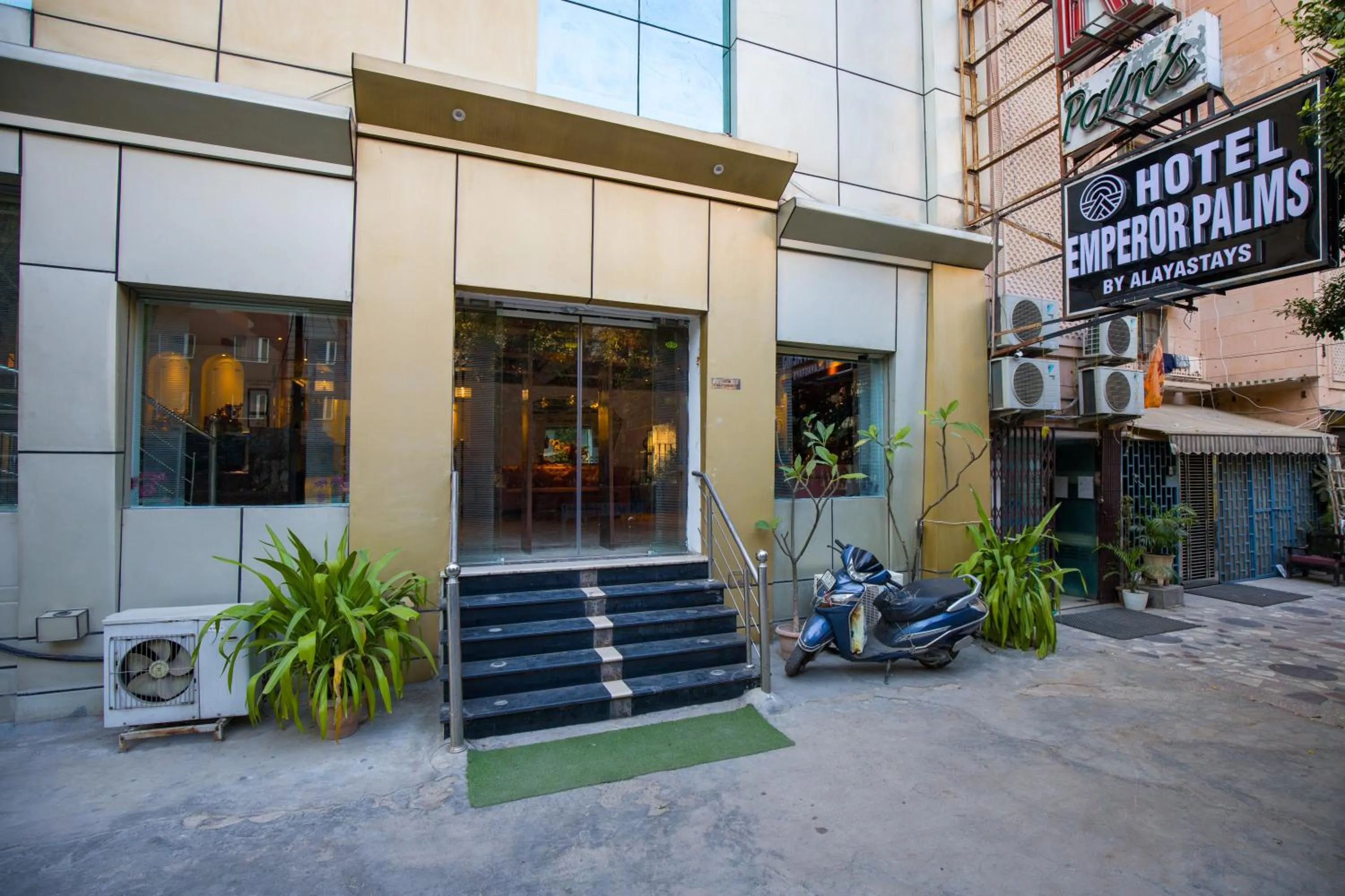 Property building in Alaya Stays Hotel Emperor Palms